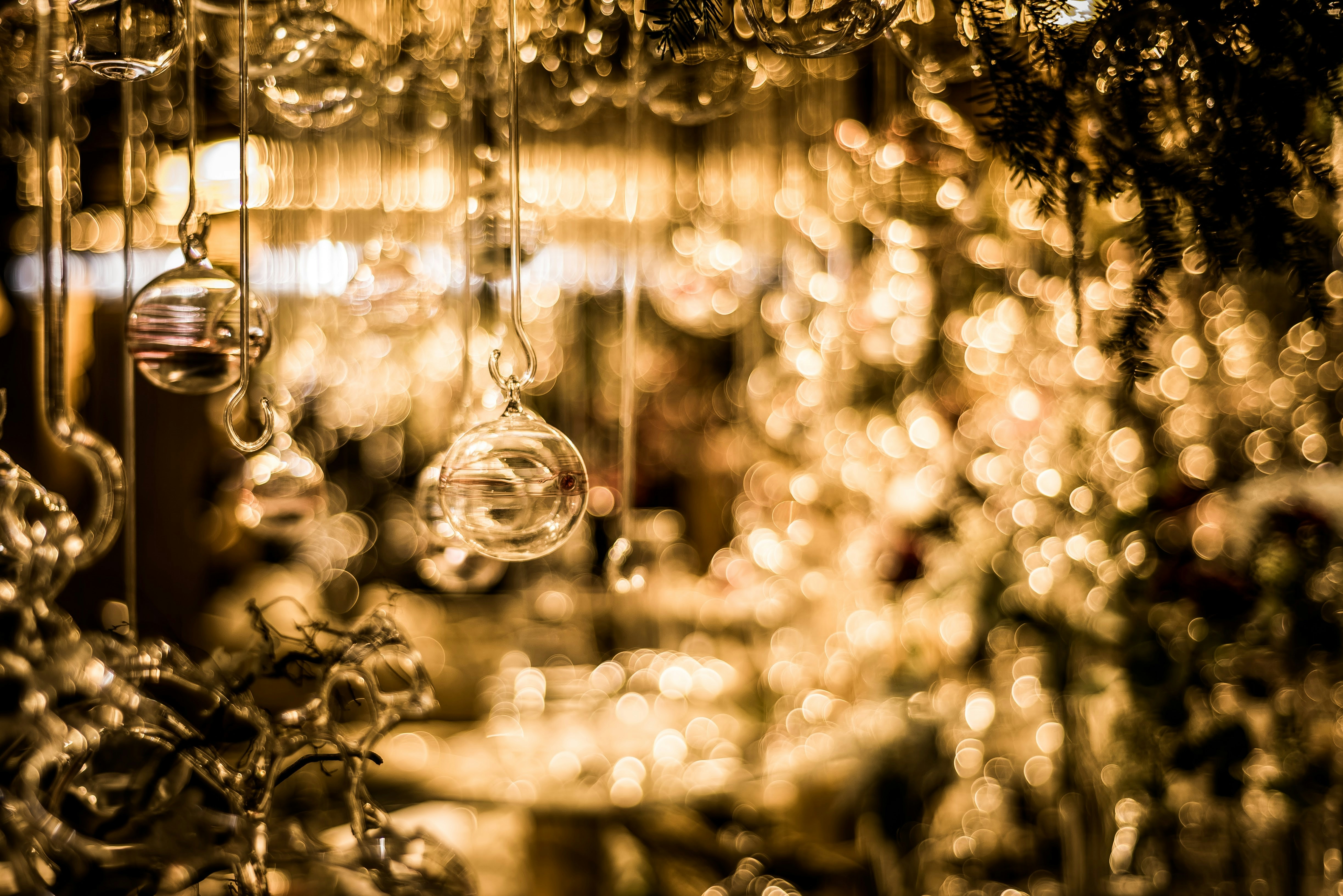 Glass Christmas Baubles with Warm Bokeh