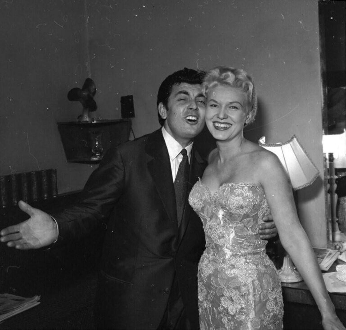 Two Smiling Celebrities Posing Together