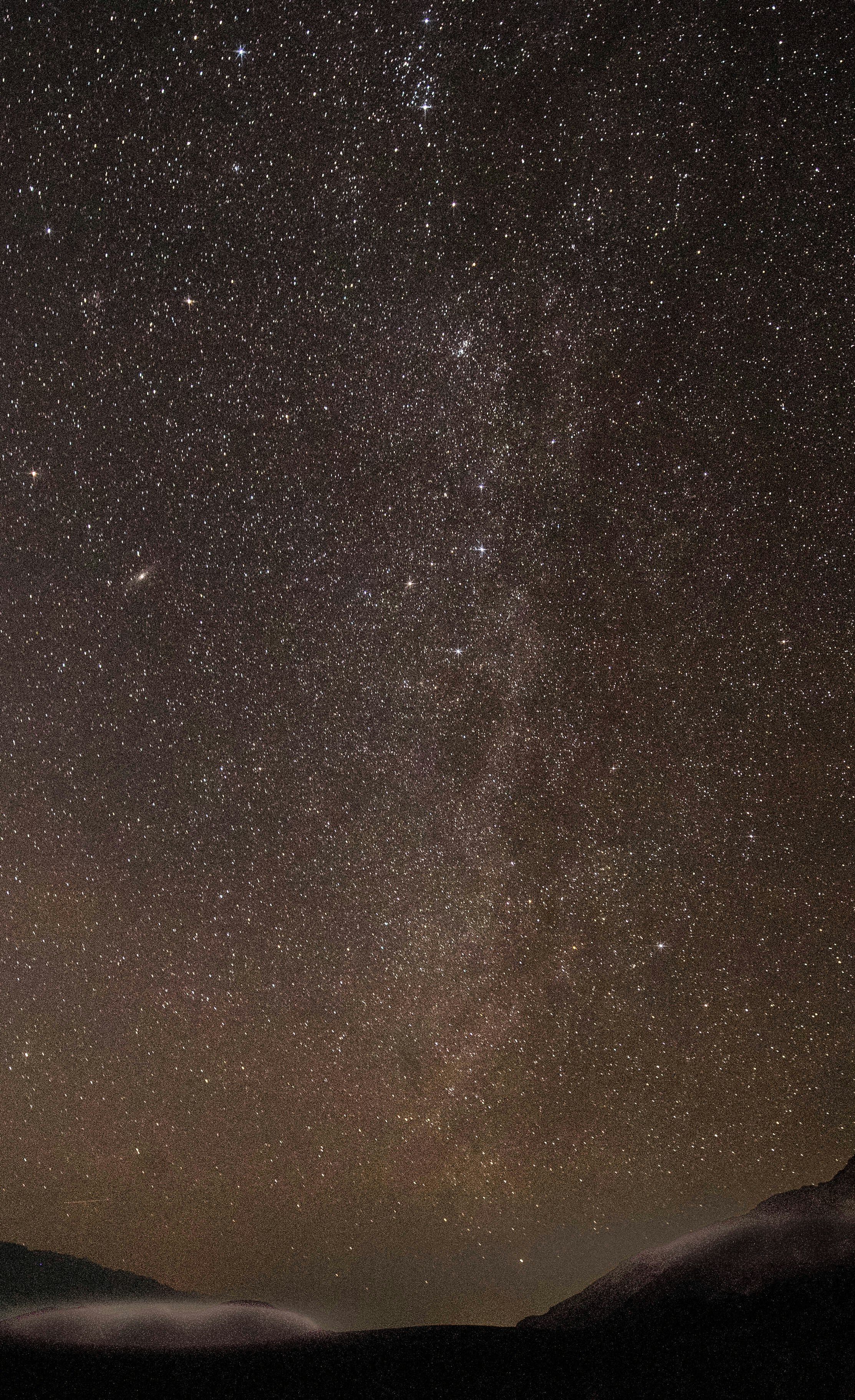 Starry Night Sky Over Mountains