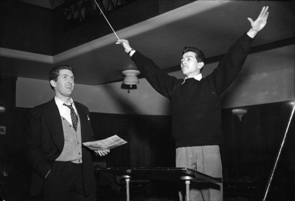 Two Men Practicing Orchestra Conducting