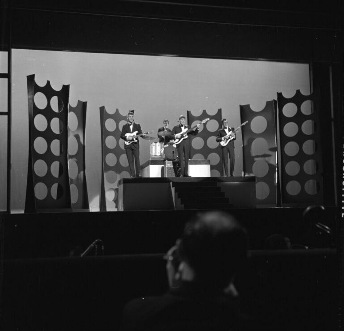 Four-piece Band Performing on Stage