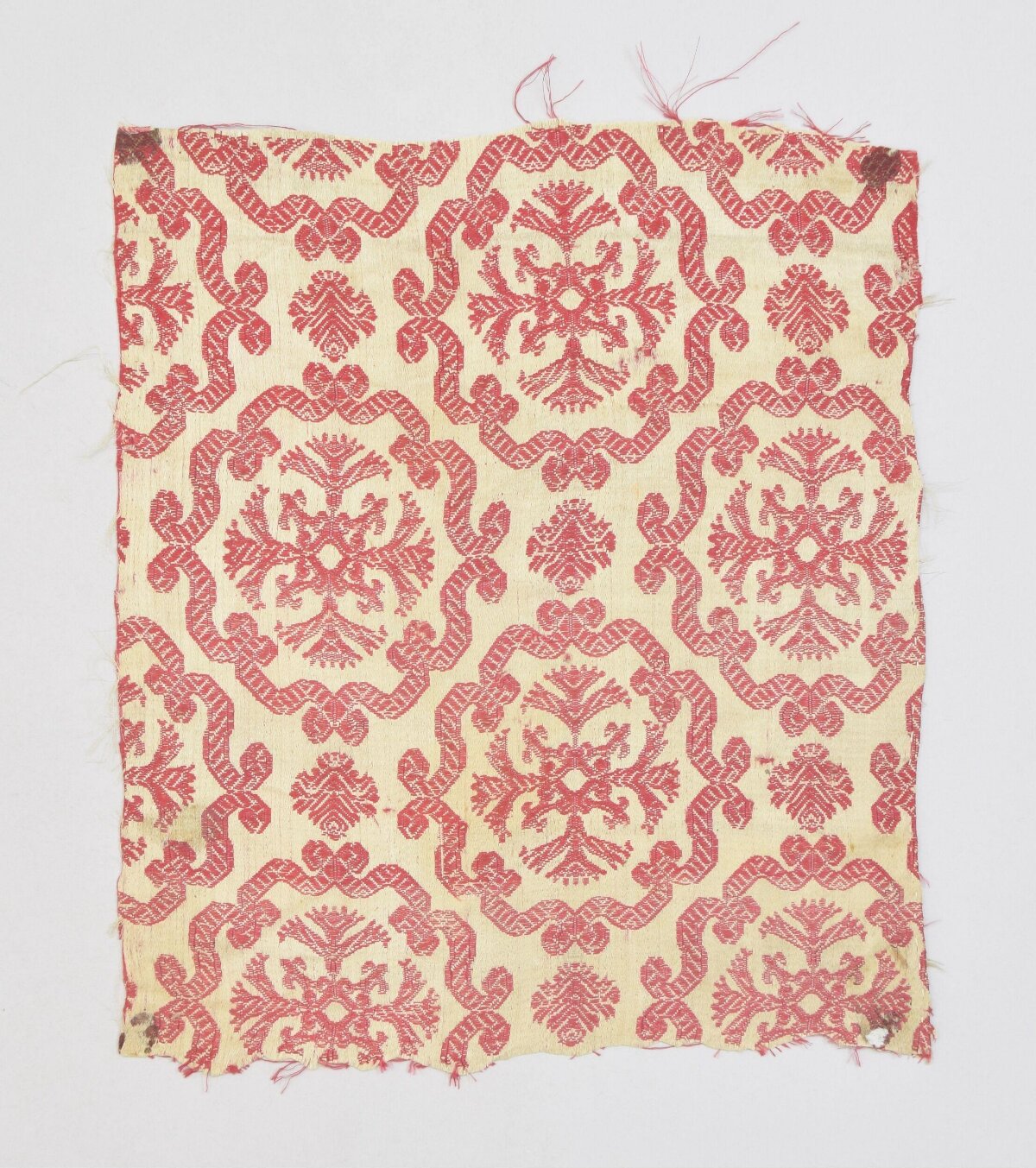 Antique Red Patterned Textile Fragment
