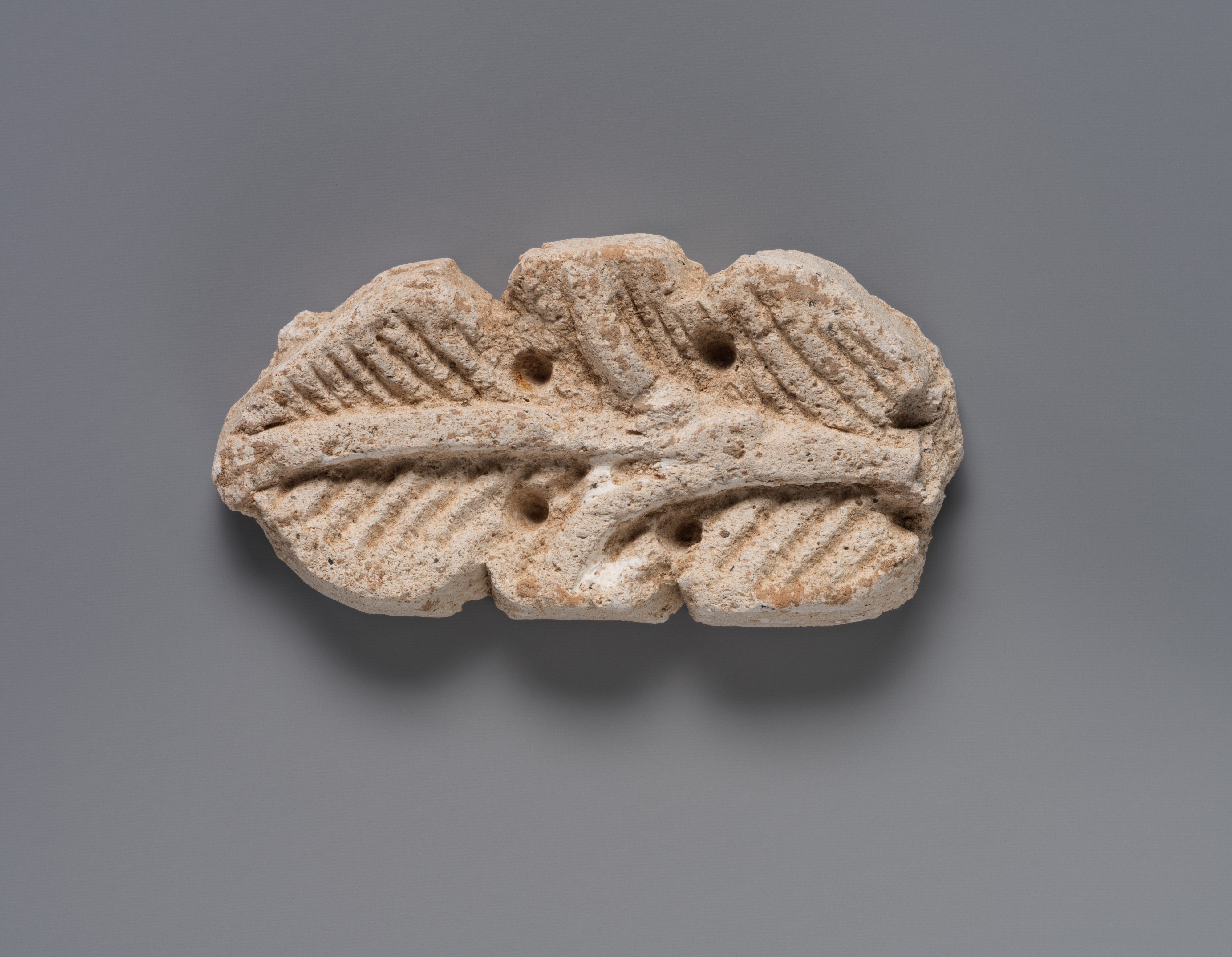 Carved Leaf-shaped Stone Artifact Fragment