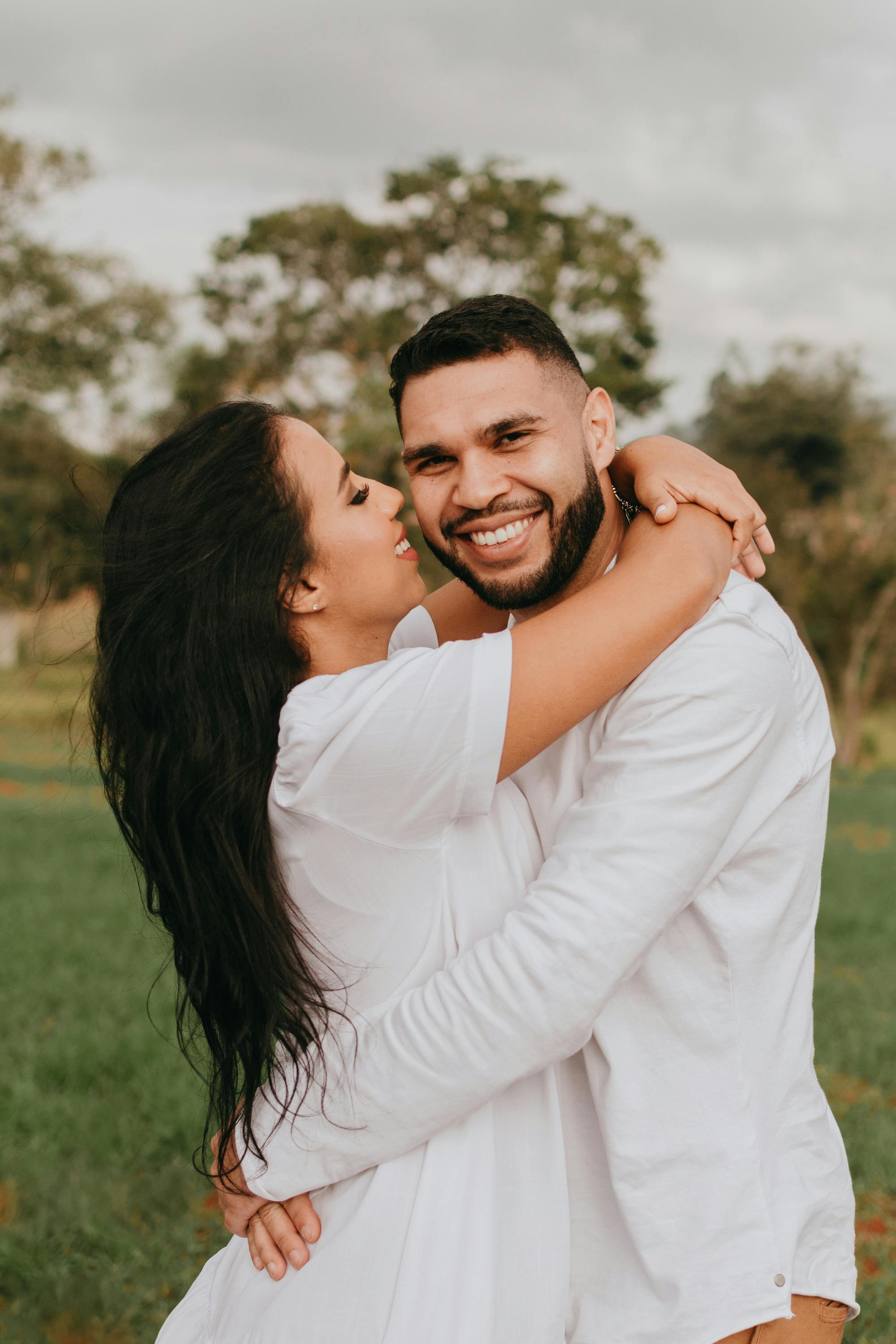Happy Couple Embracing Outdoors