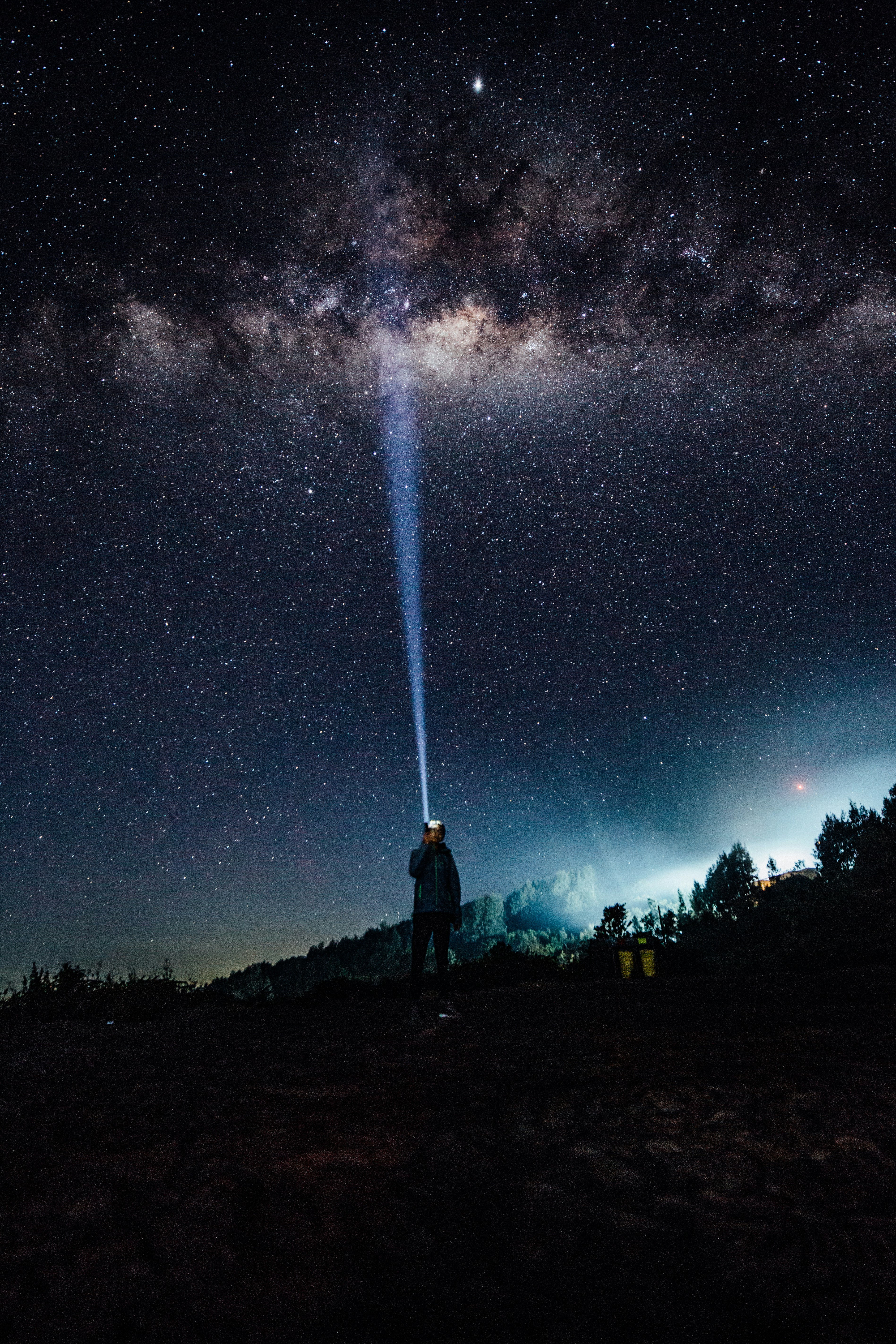Hiker Under Starry Night Sky
