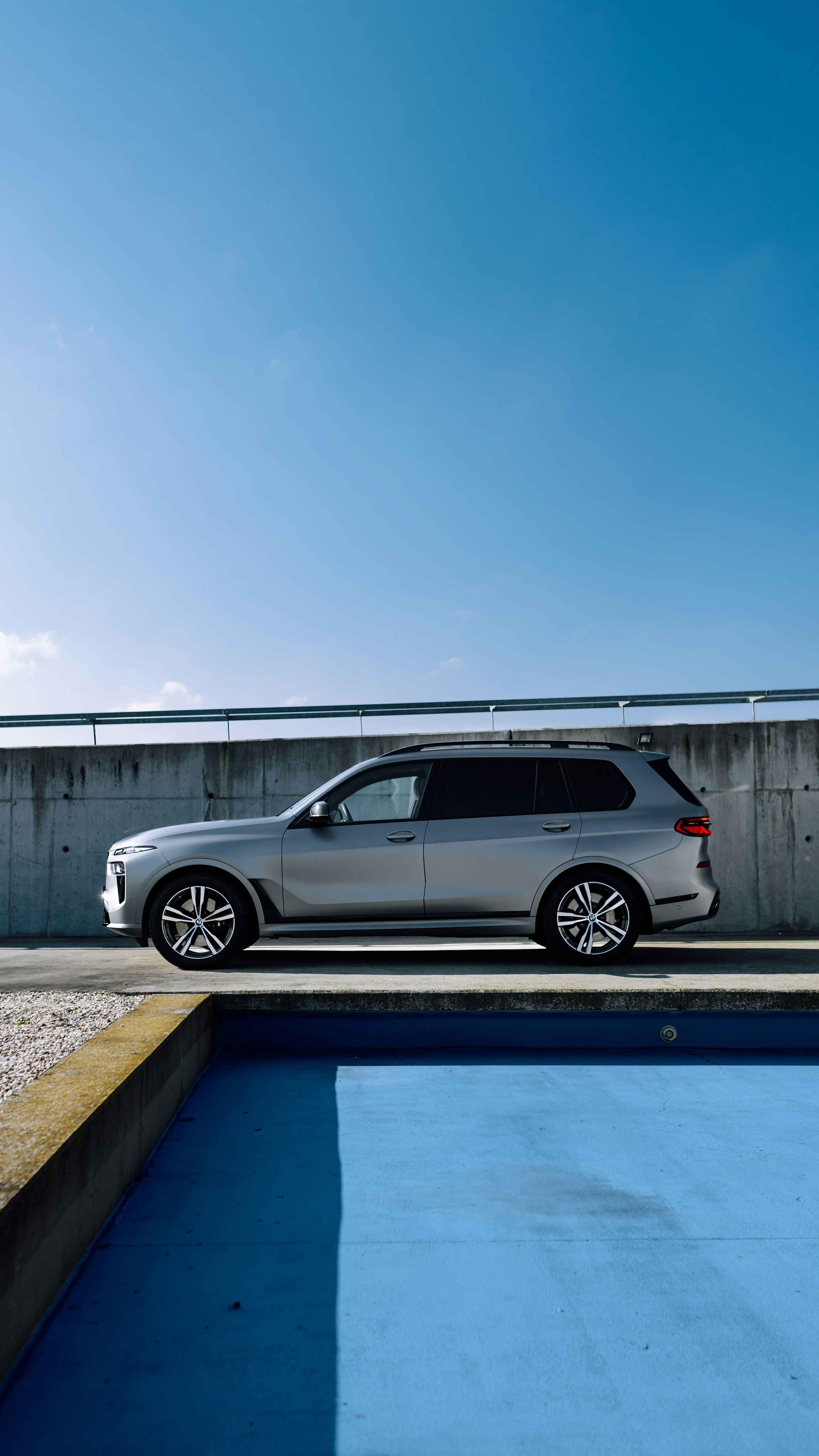 Silver BMW SUV Parked Outdoors
