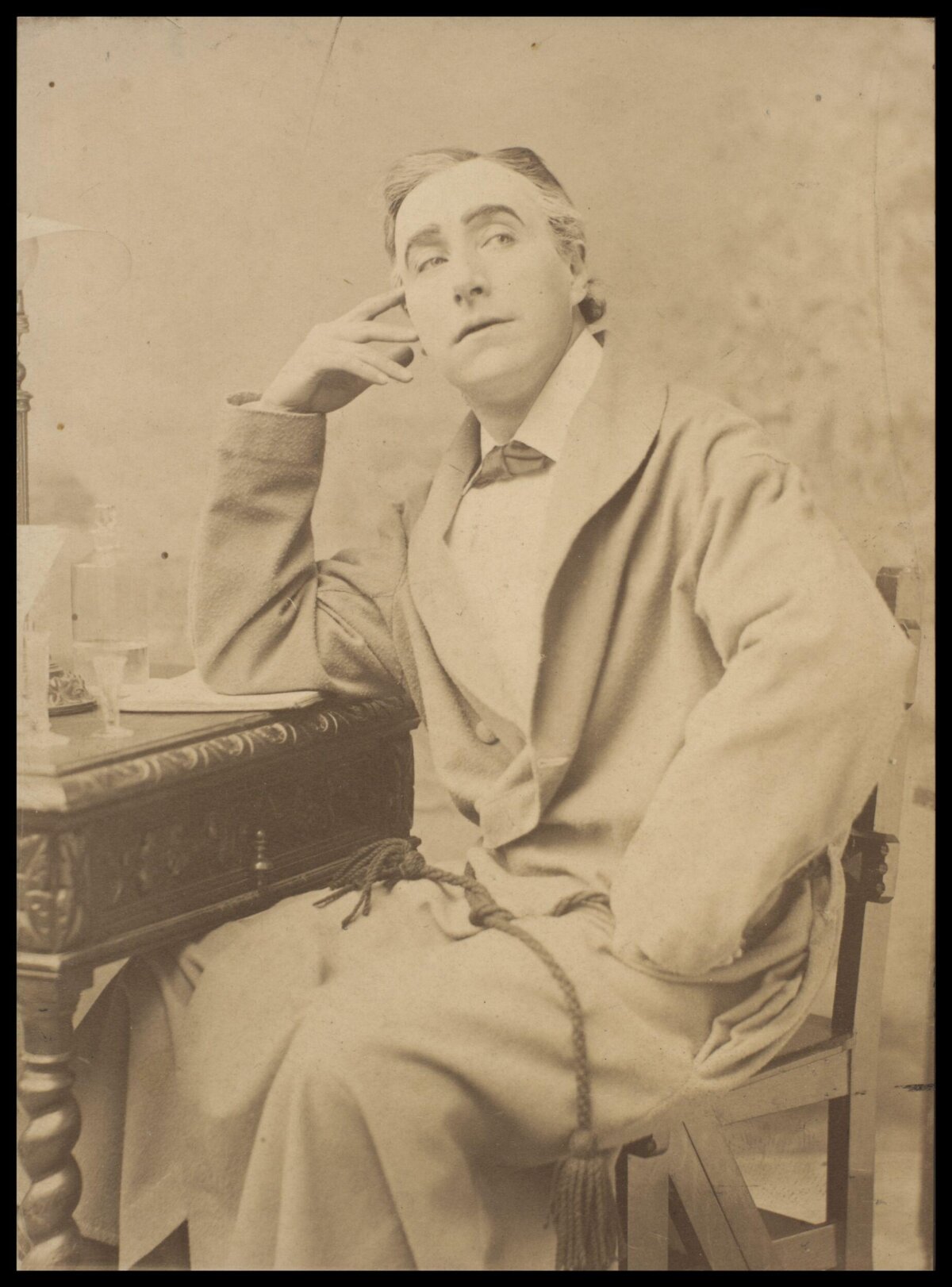 Vintage Seated Man Studio Portrait