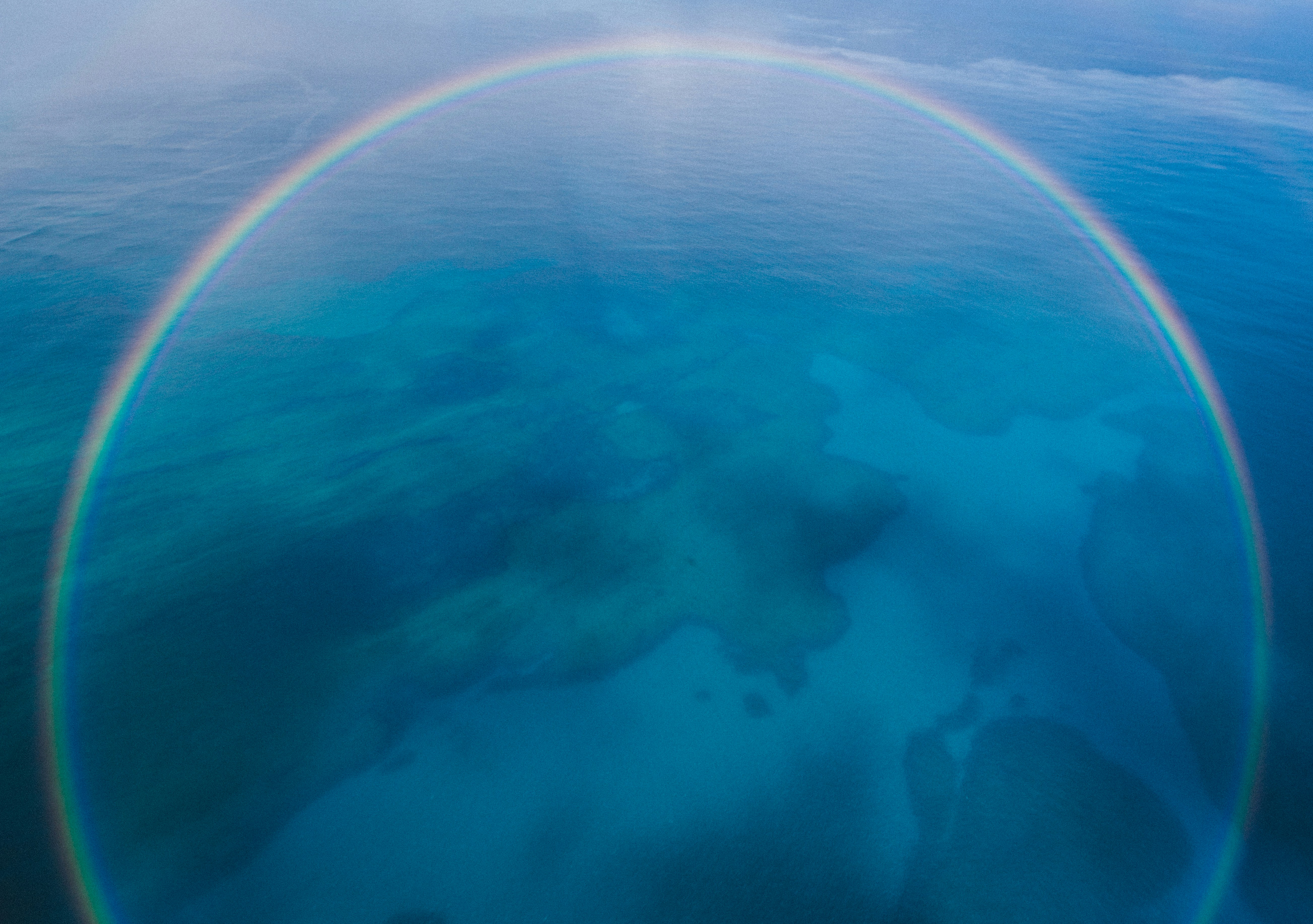 Circular Rainbow Over Ocean