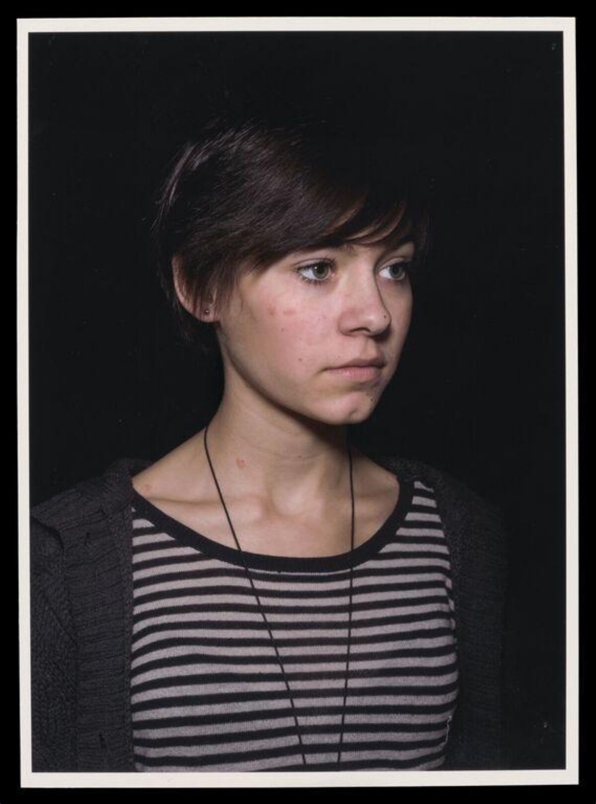 Studio Portrait of Young Woman with Short Hair