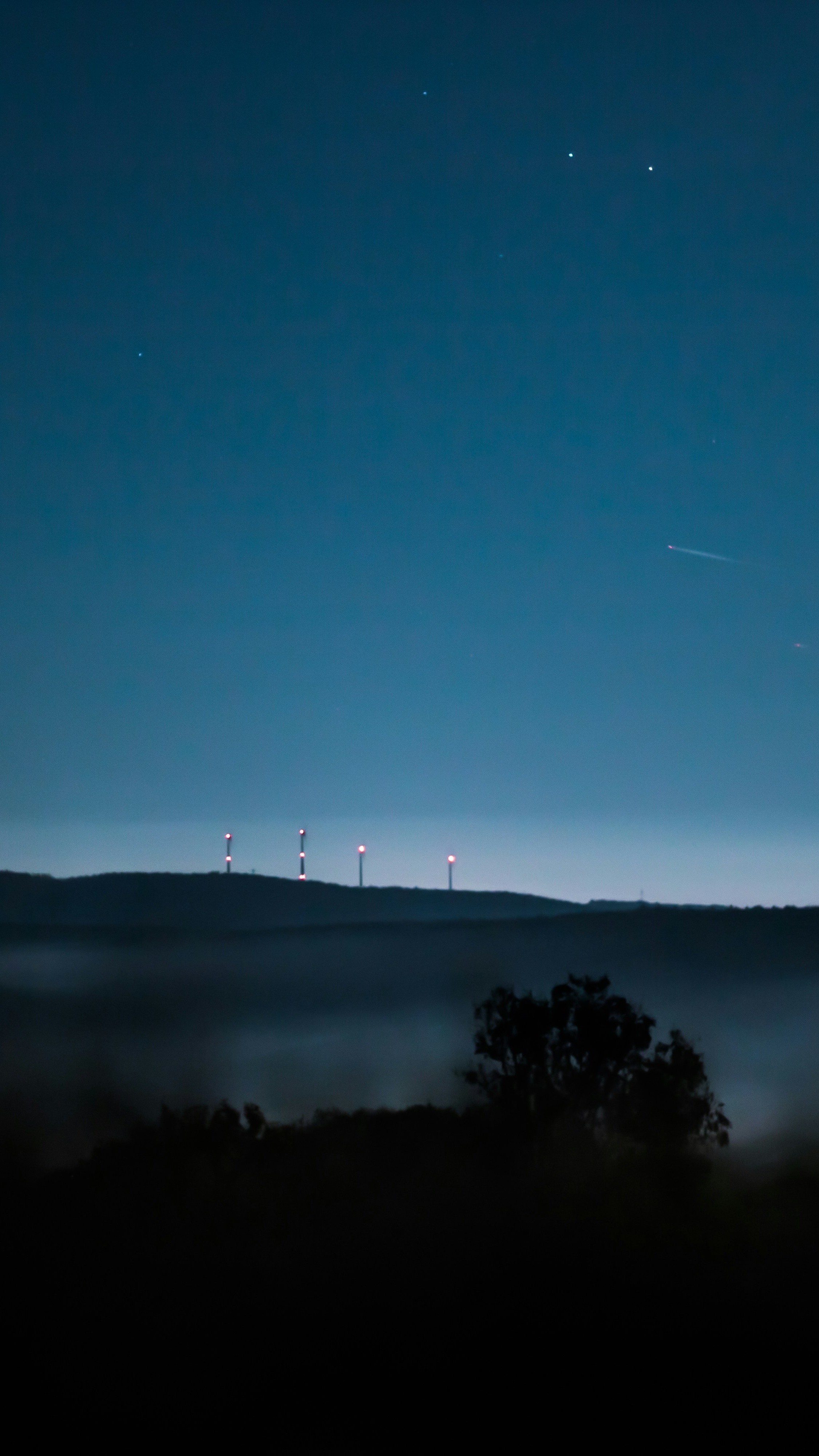 Night Sky Over Misty Hills