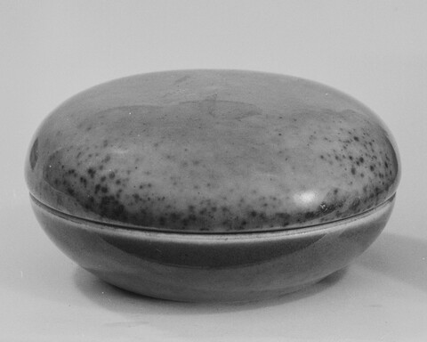 Grayscale Photo of Round Porcelain Ink Box