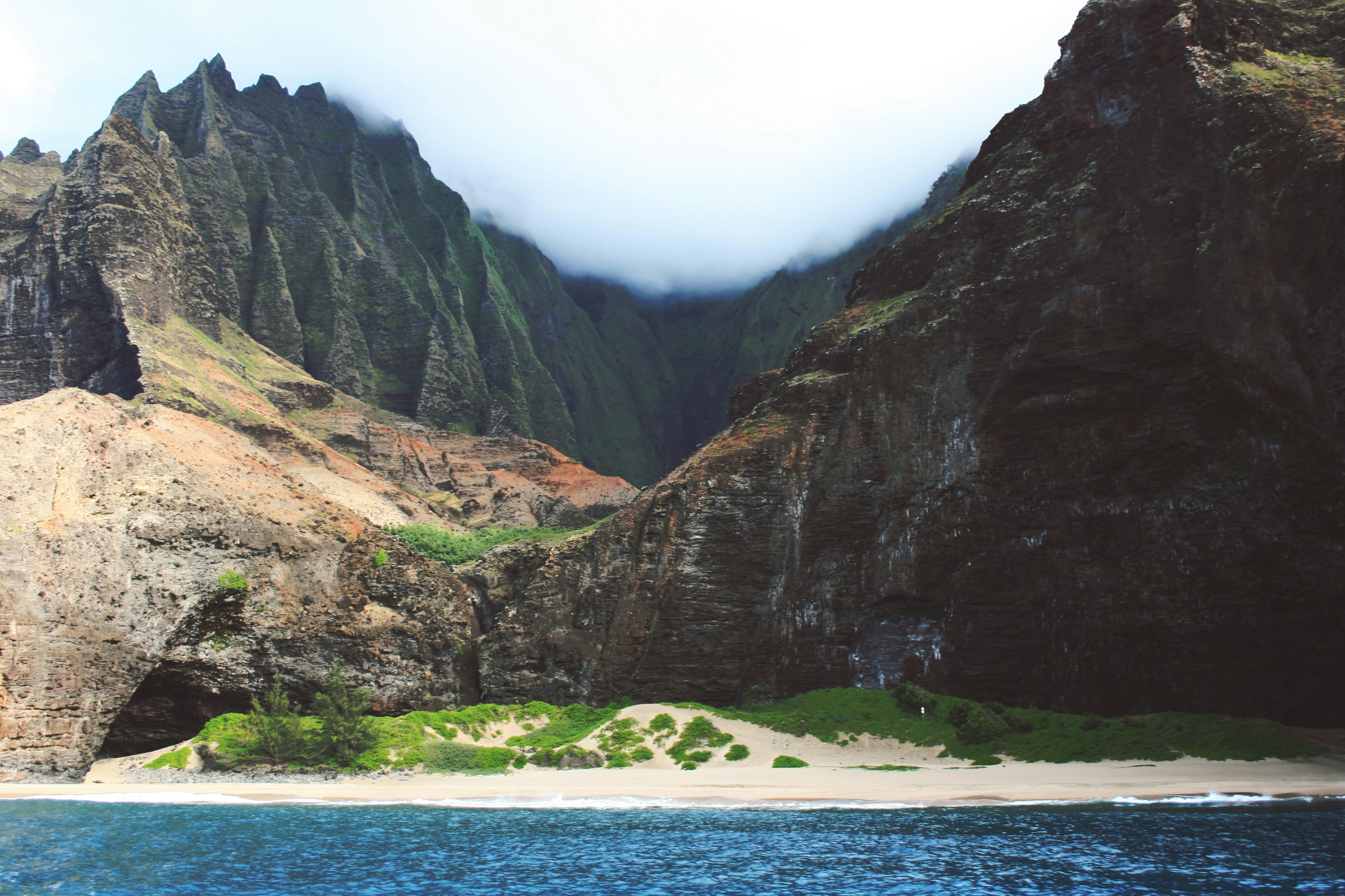 Hidden Beach Between Steep Coastal Cliffs