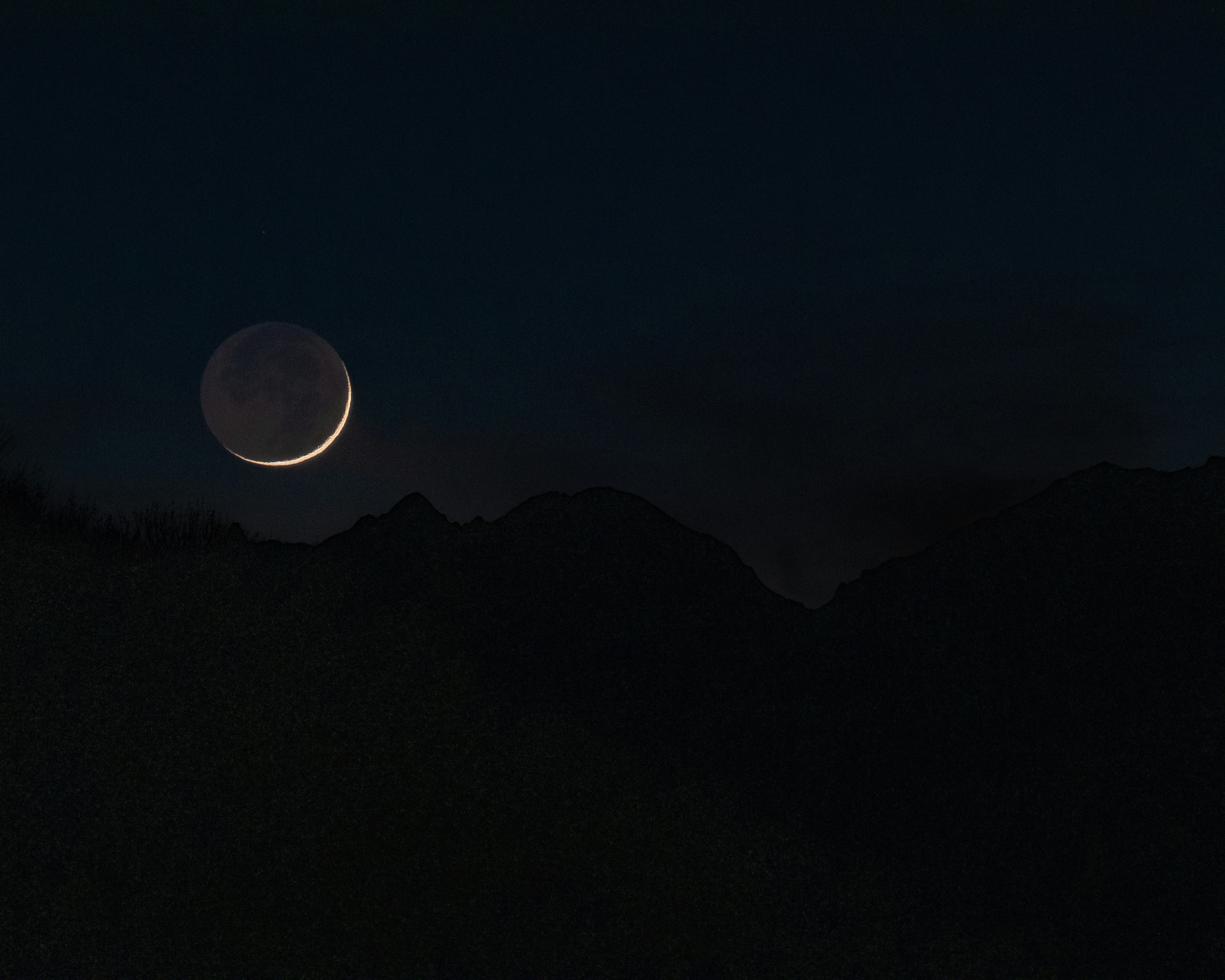 Crescent Moon Over Night Mountains