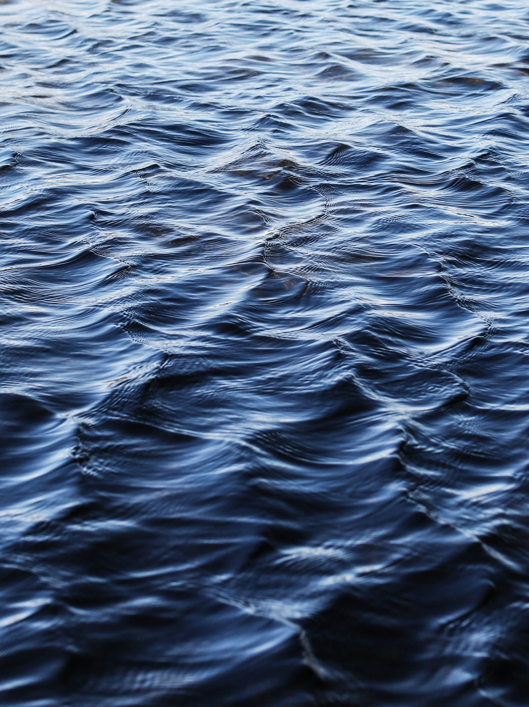 Dark Blue Rippled Water Surface