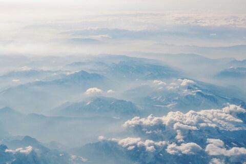 Aerial View of Layered Misty Mountains