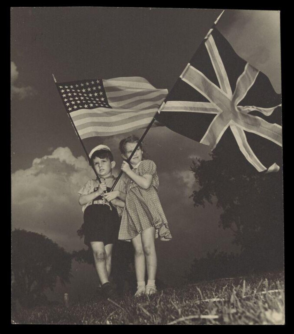 Two Children Holding US and UK Flags — Flags