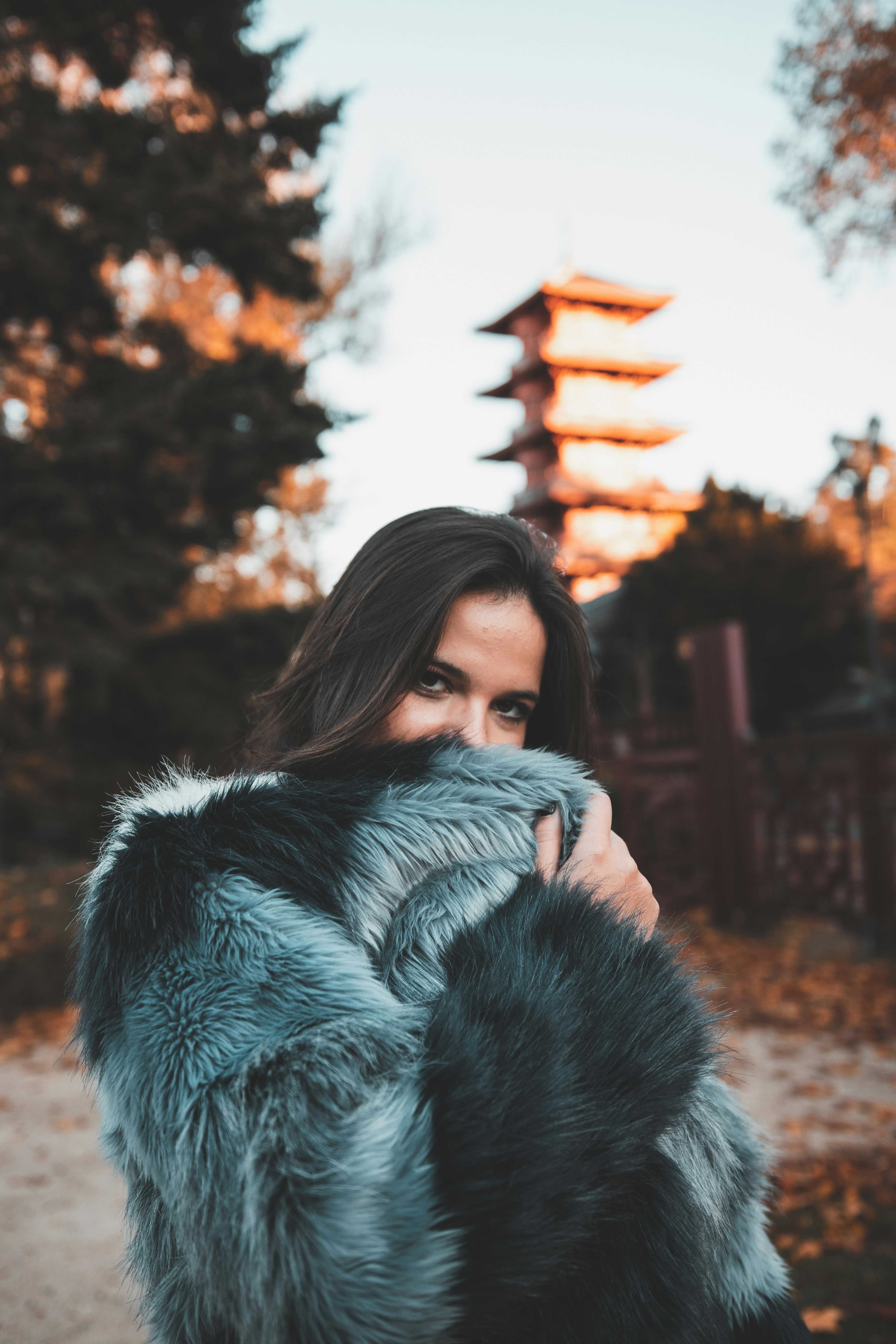 Woman in Fur Coat by Autumn Pagoda