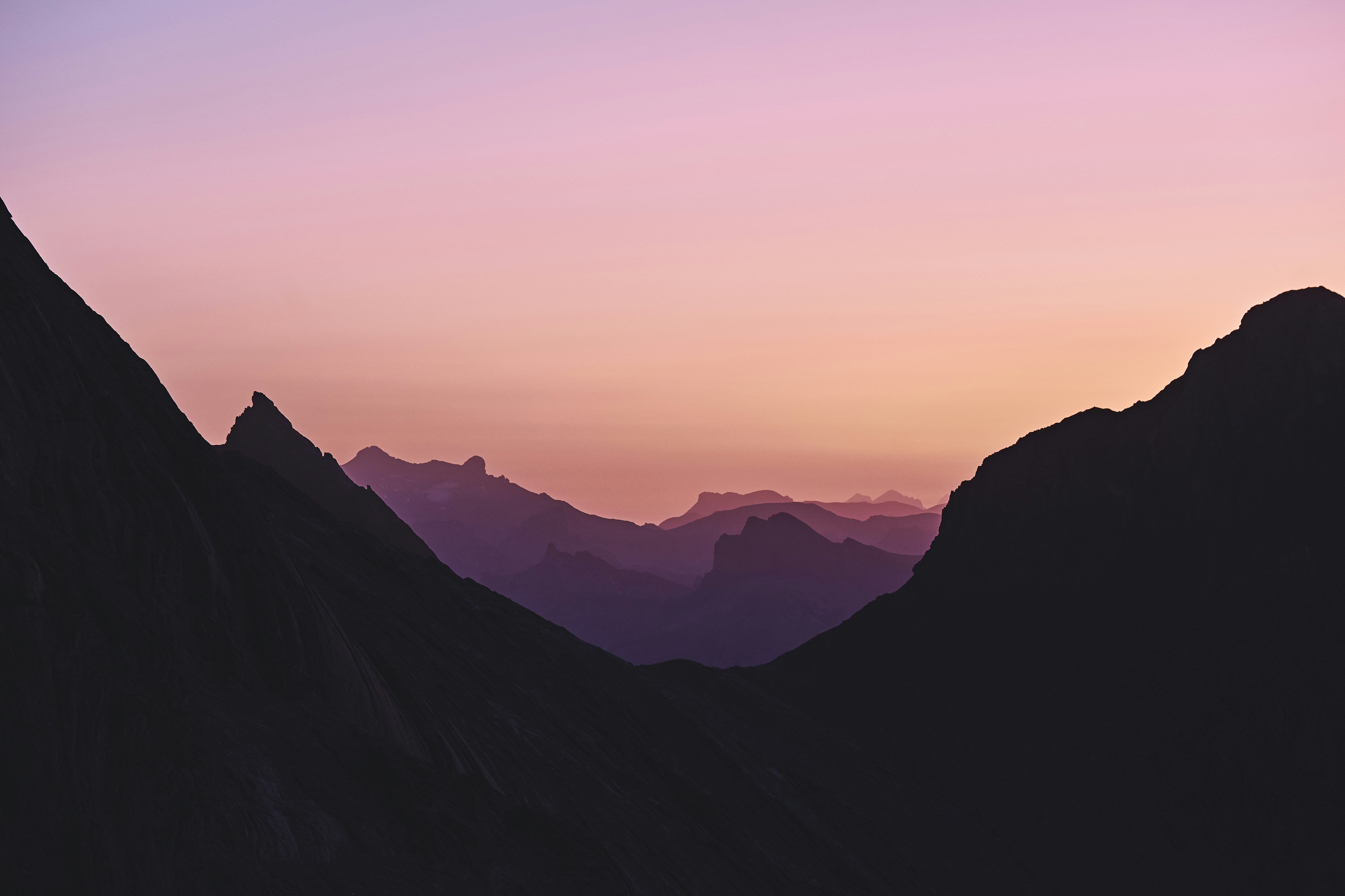 Layered Mountain Silhouettes at Dusk