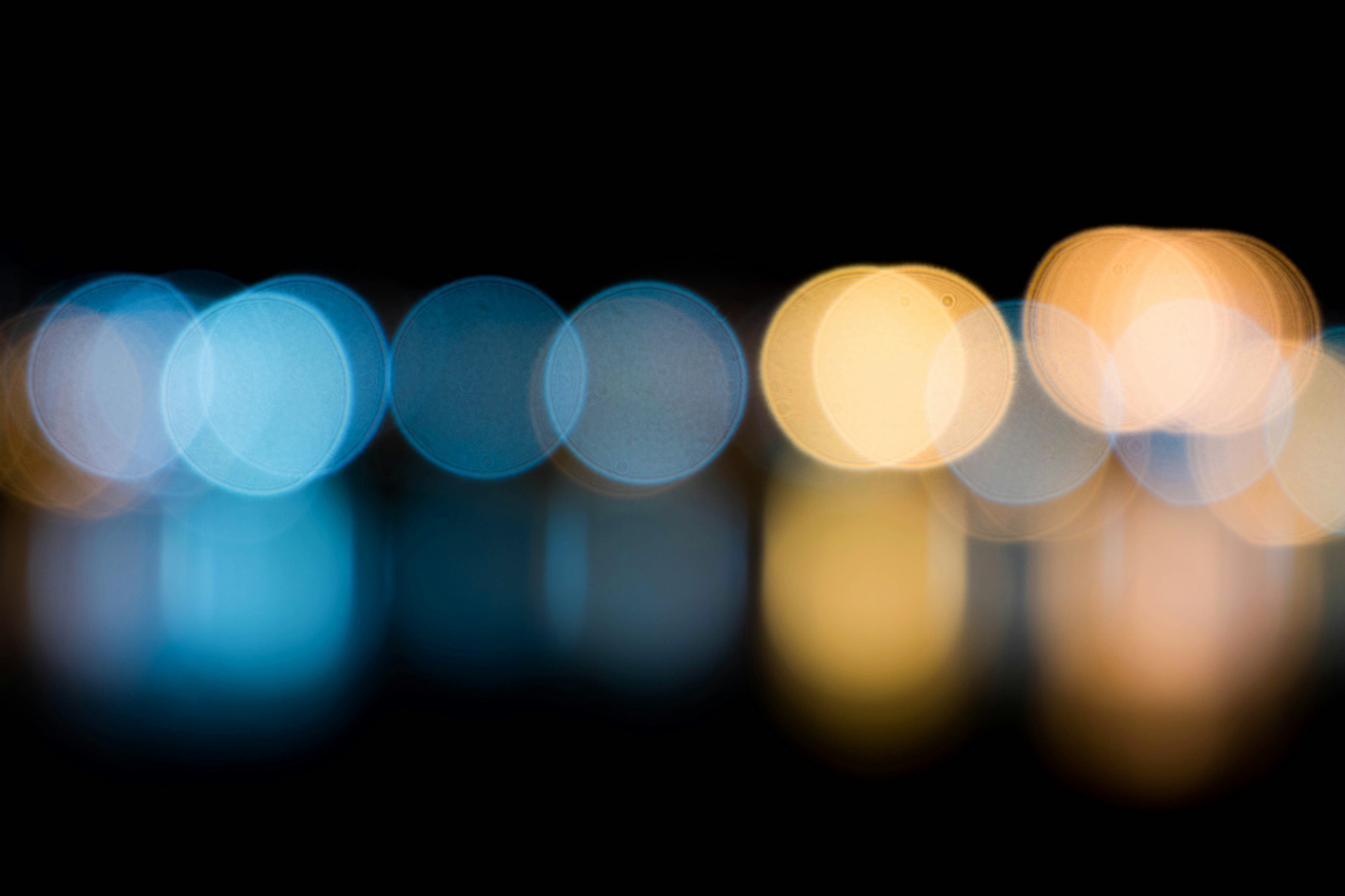 Blue and Warm Bokeh Lights With Reflection
