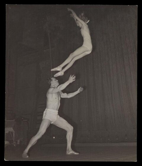 Vintage Acrobats Performing Stunt