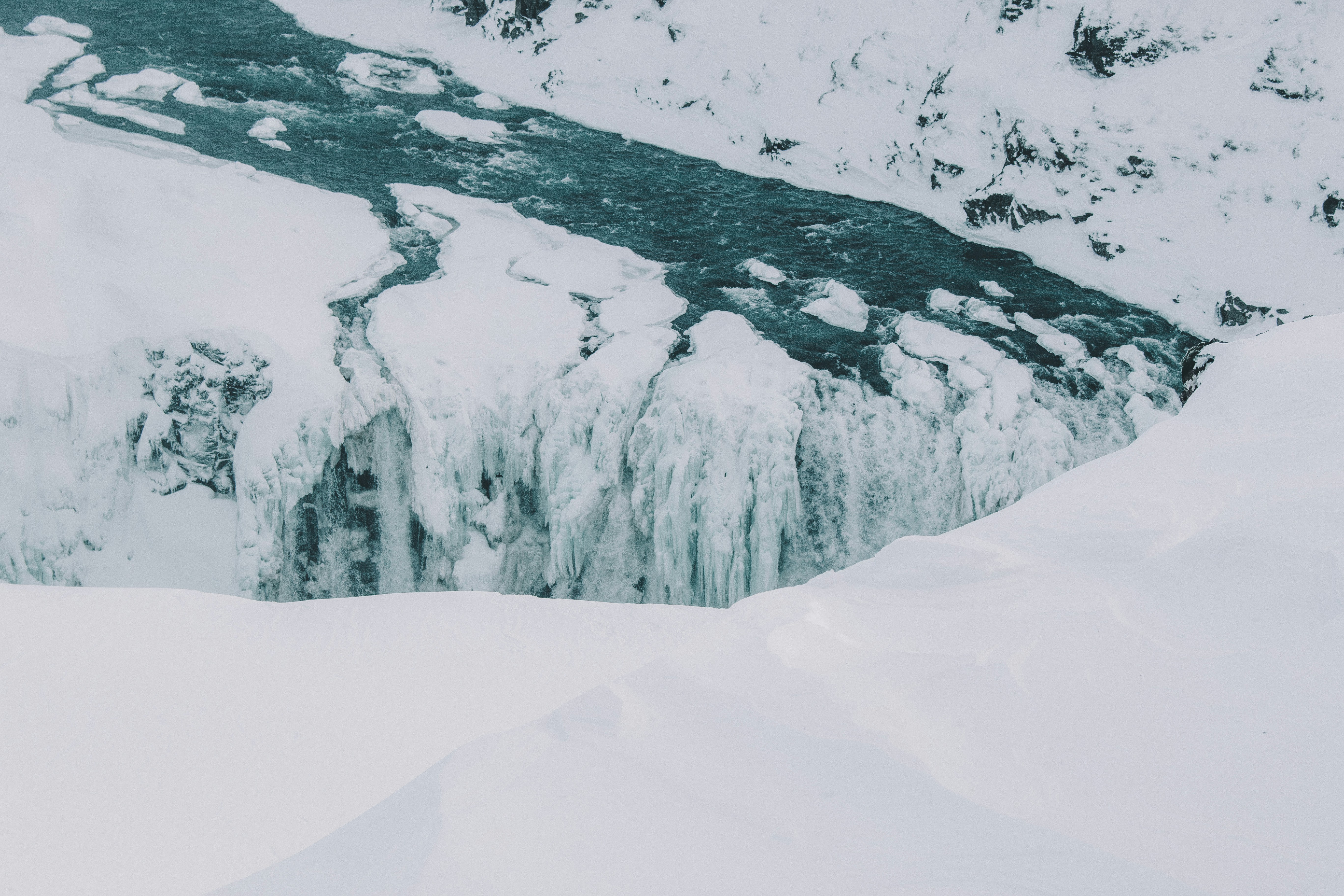 Frozen Snow-Covered Waterfall