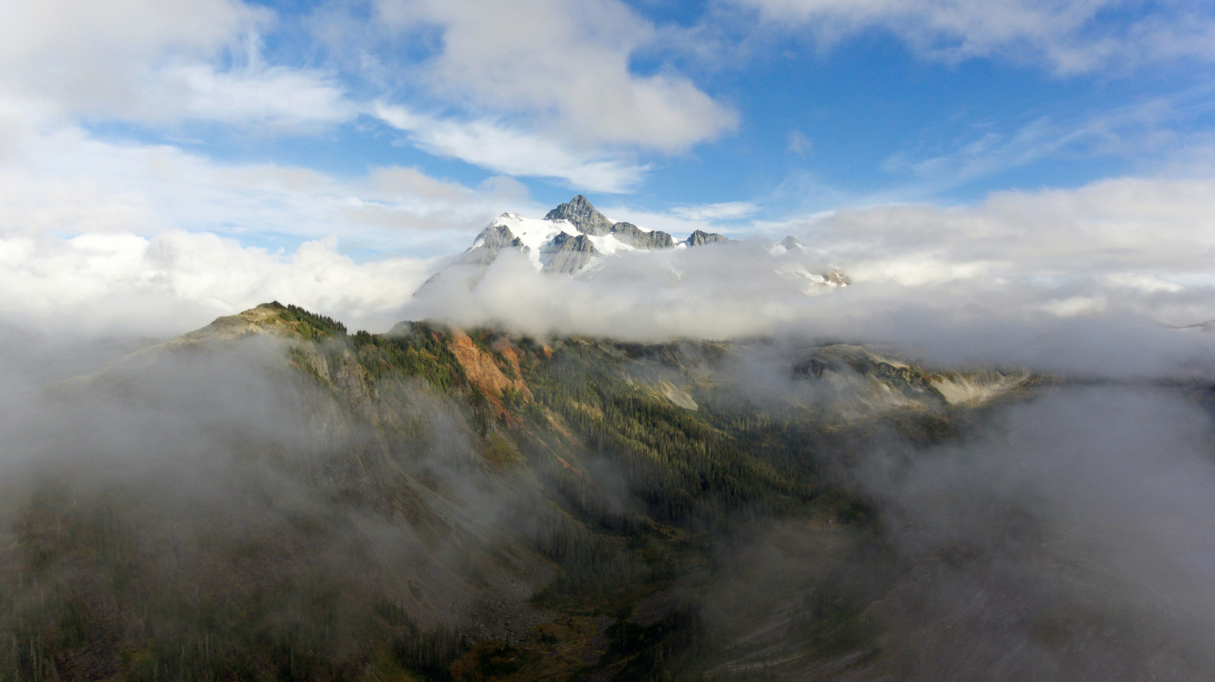 Snow-capped Peak Among Clouds