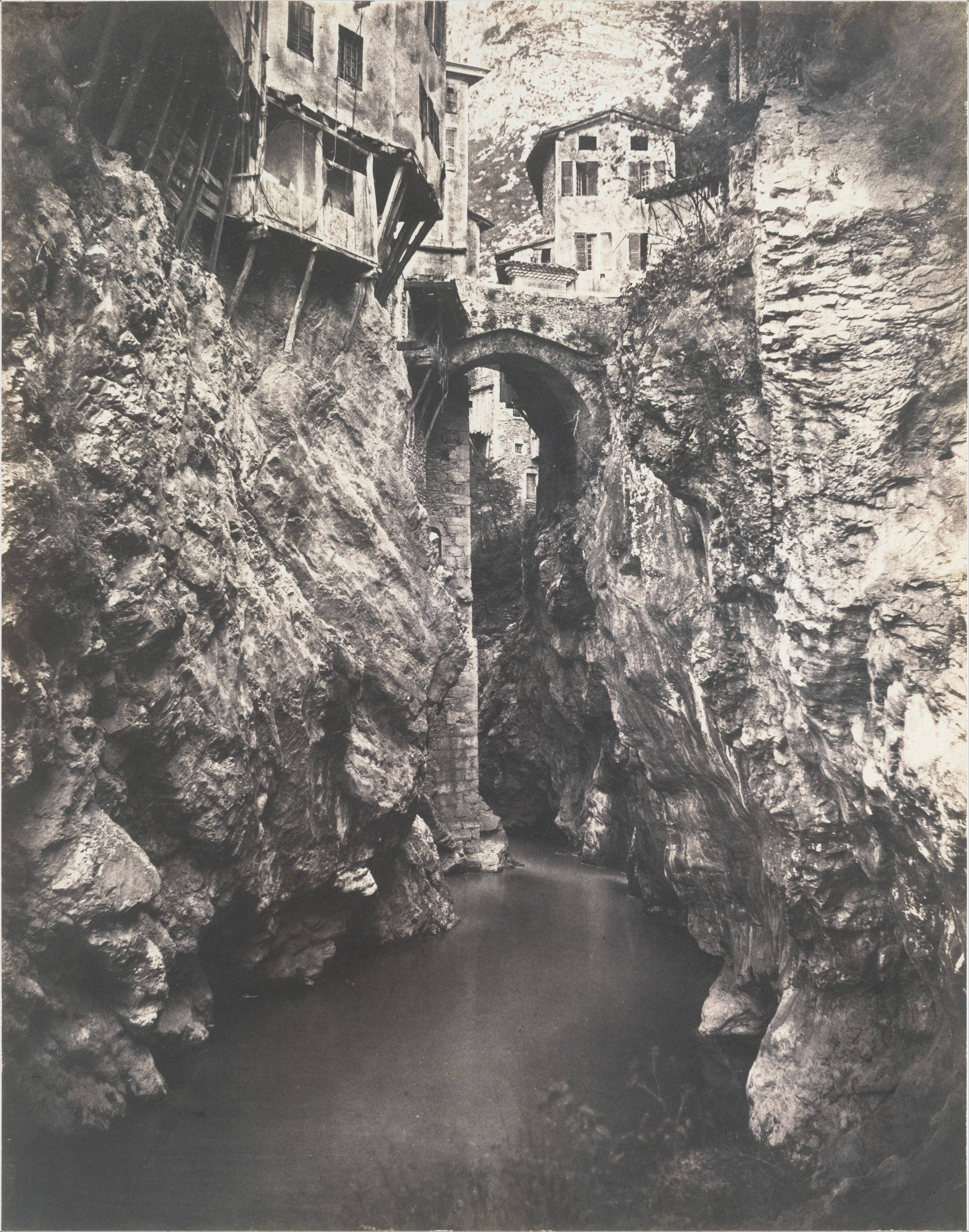 Cliffside Village Above River Gorge