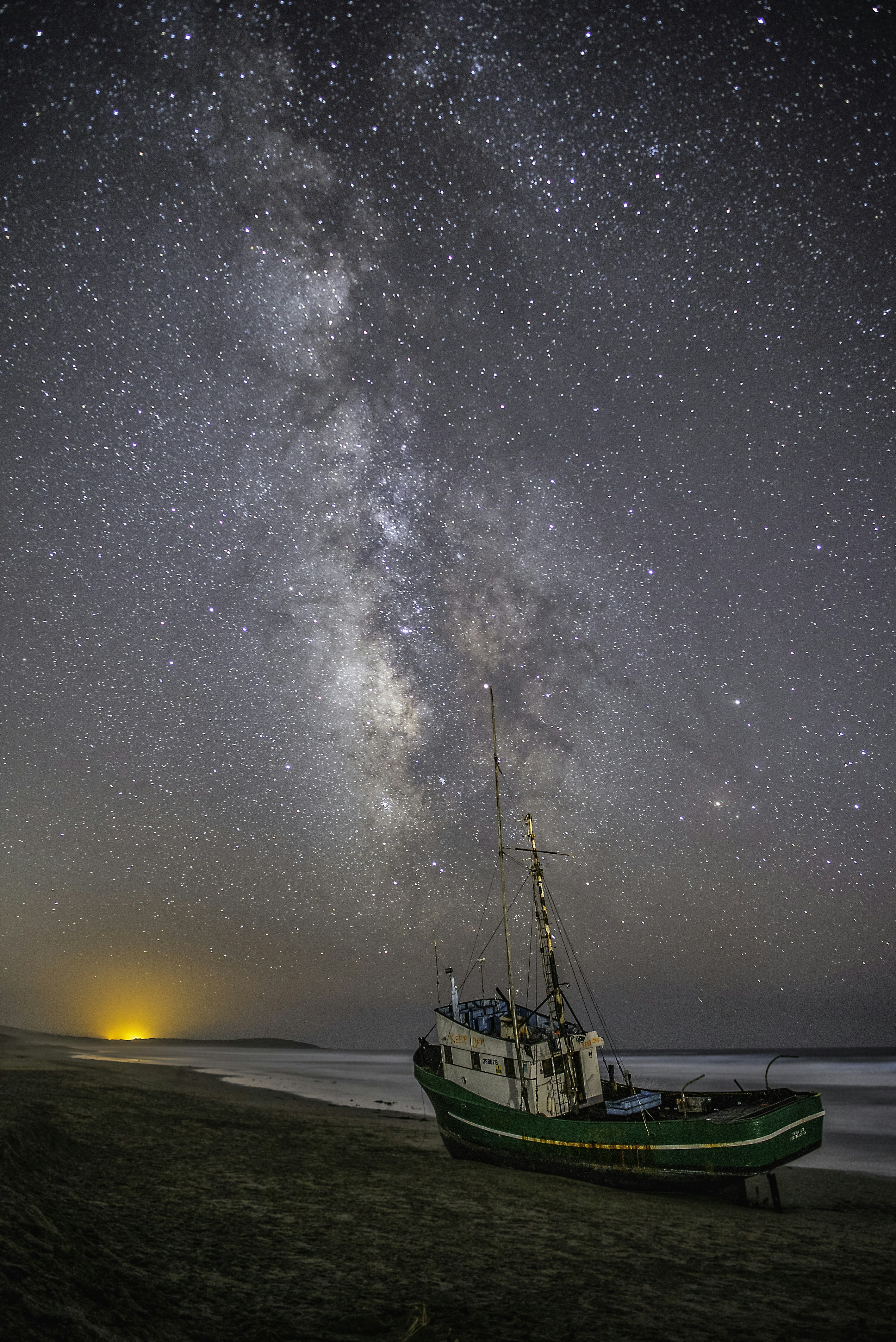 Beached Boat Under Starry Milky Way