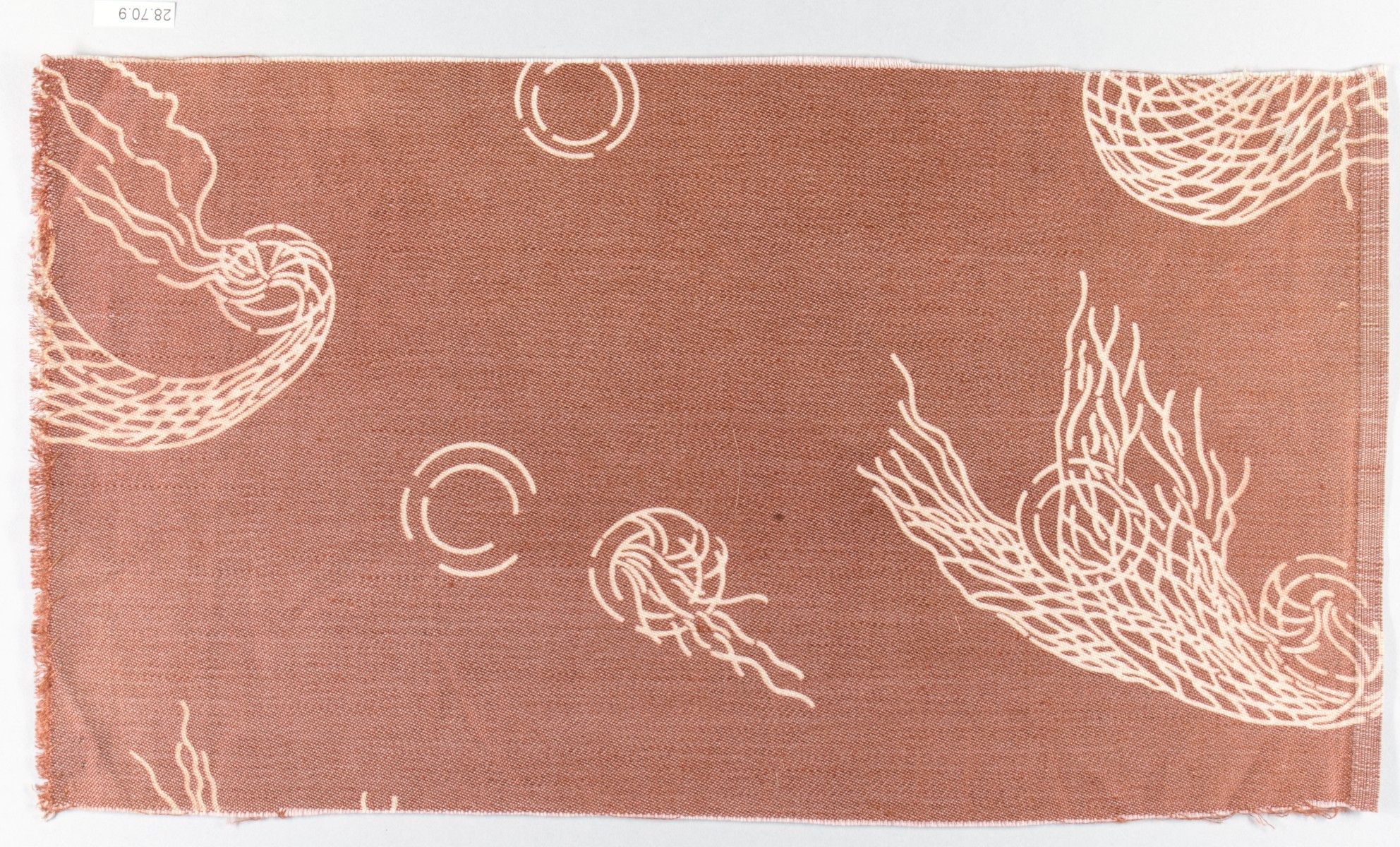Brown Textile Fragment With Wave Pattern