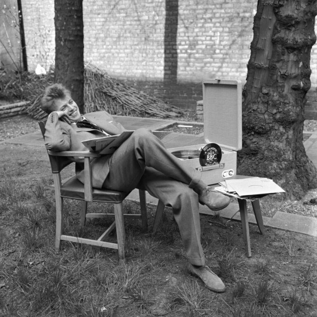 Young David Bowie Relaxing With Record Player