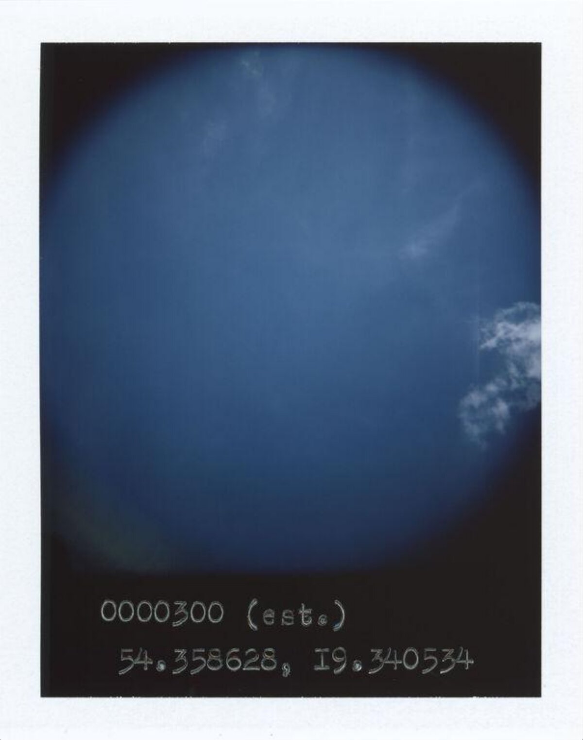 Blue Sky with Handwritten Coordinates