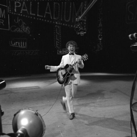 Guitarist Performs on Palladium Stage