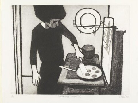 Woman Frying Tomatoes
