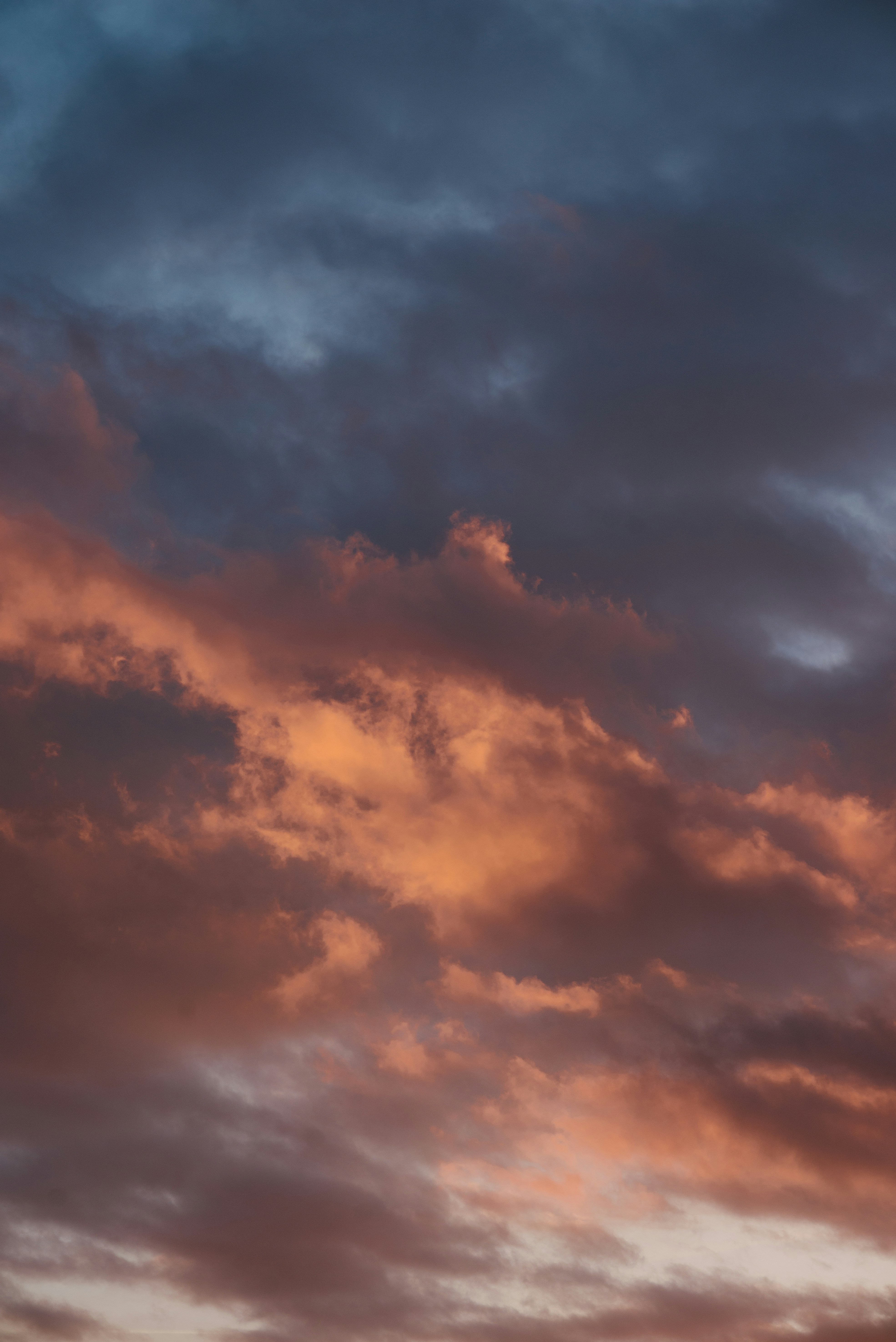 Sunlit Clouds at Dusk