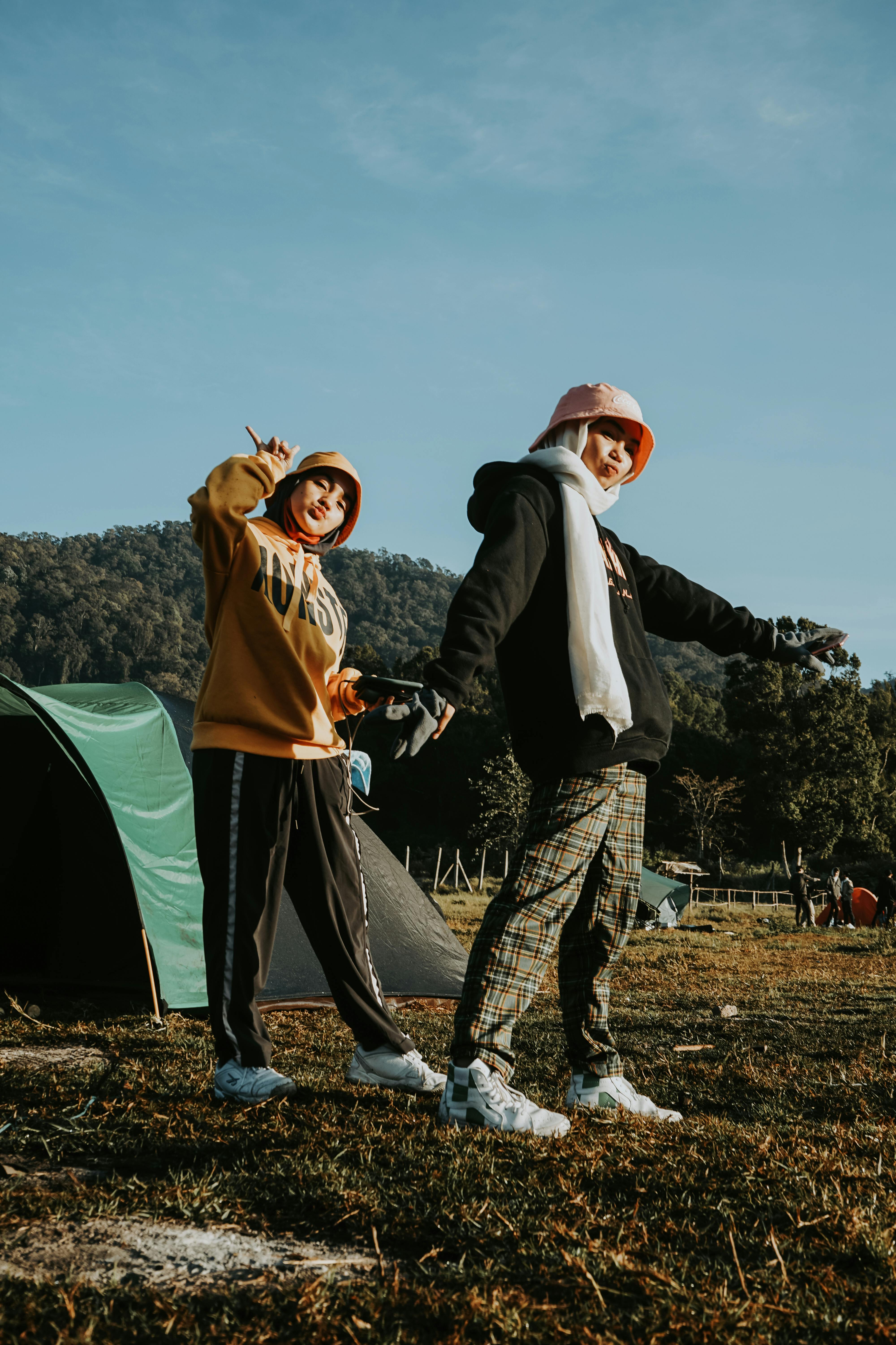Two Friends Camping Outdoors