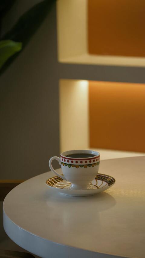 Cup of Black Coffee on Table