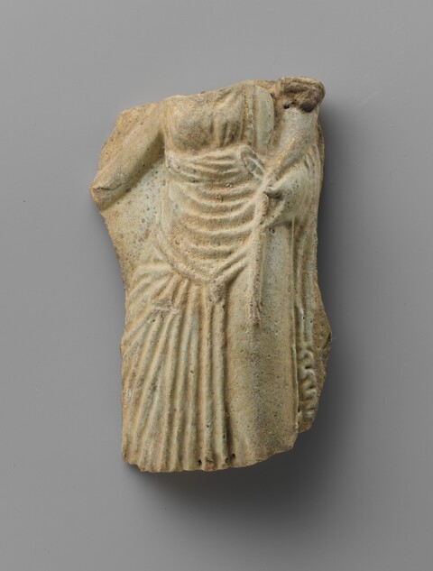 Fragment of Ancient Female Statuette