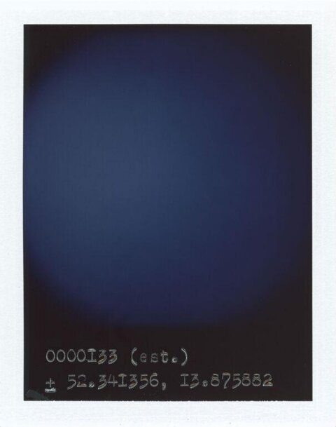 Polaroid with Handwritten Coordinates