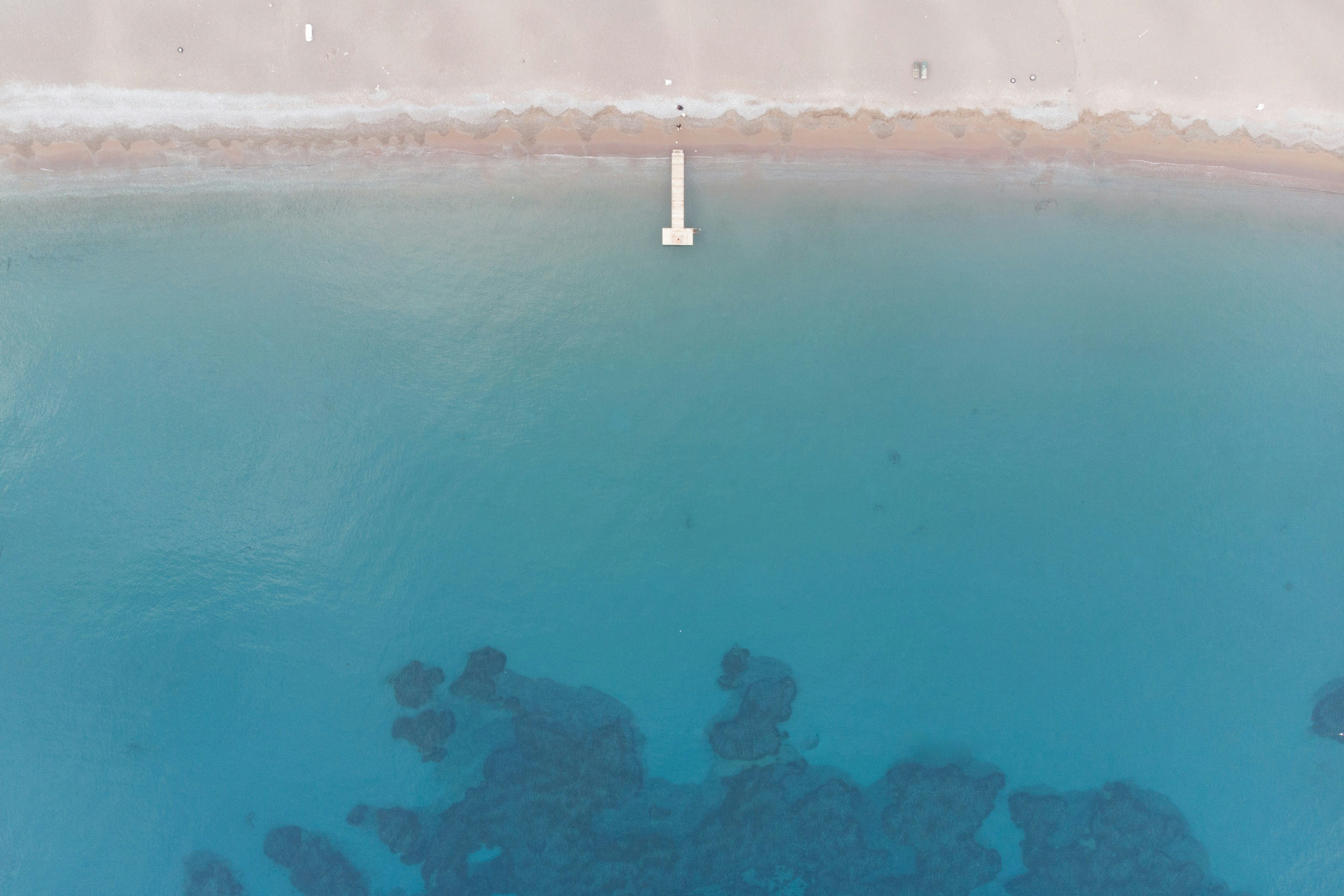 Aerial View of Beach with Jetty