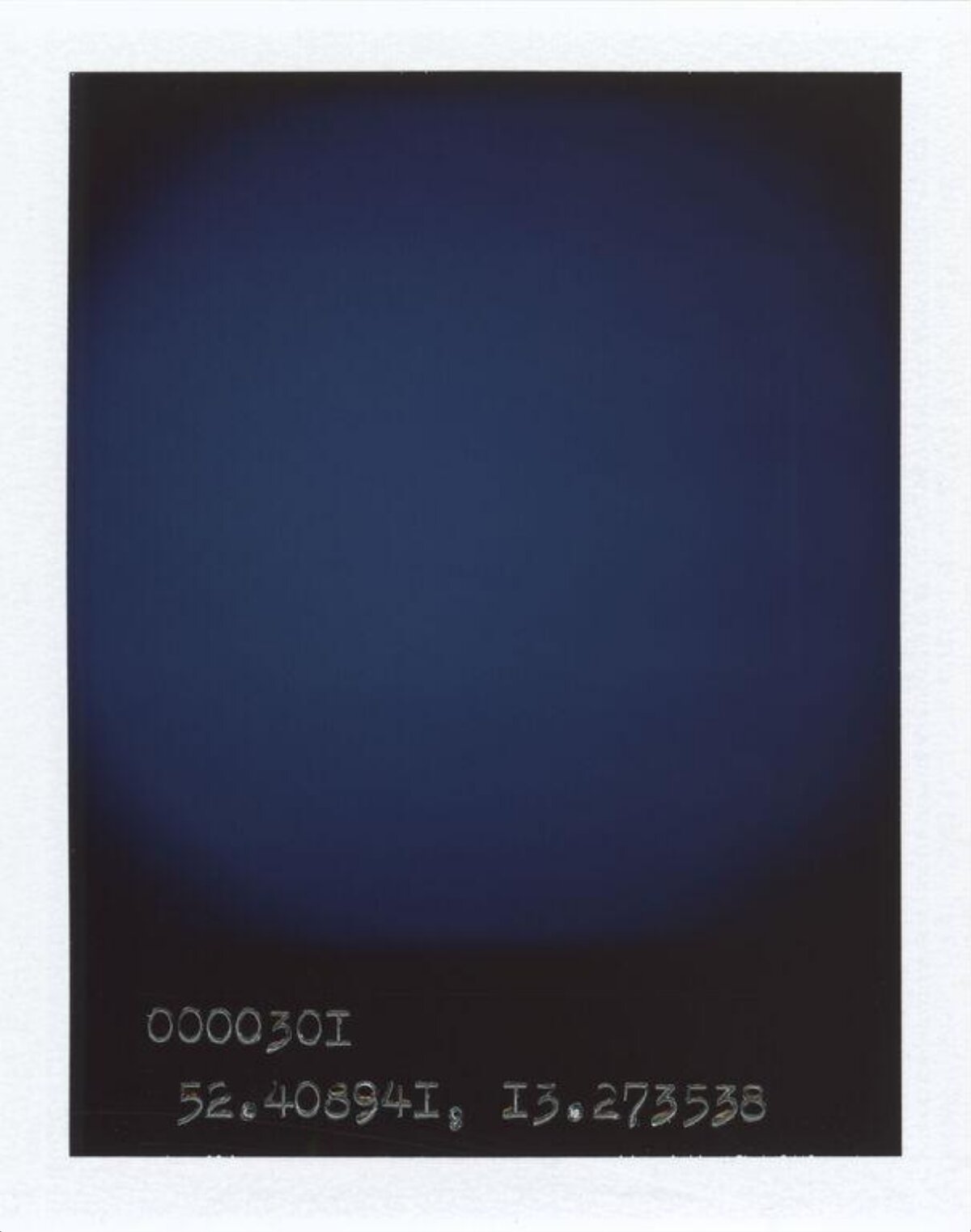 Polaroid with Handwritten Coordinates