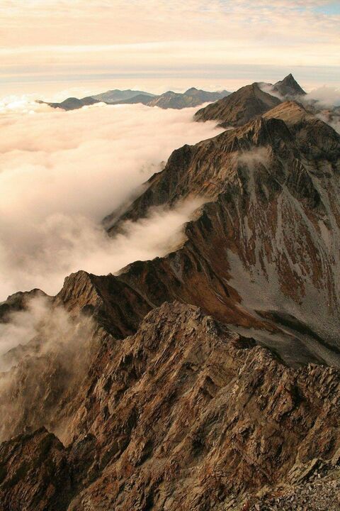 Mountain Peaks Above Sea of Clouds