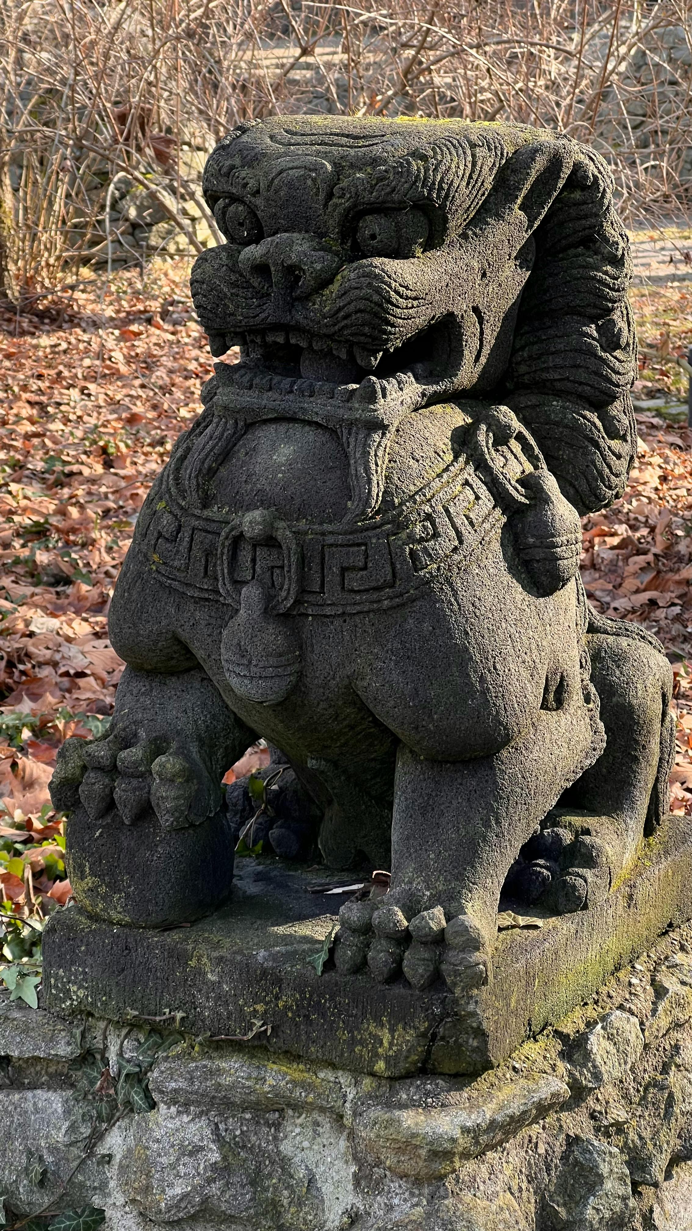 Ancient Stone Guardian Lion Statue