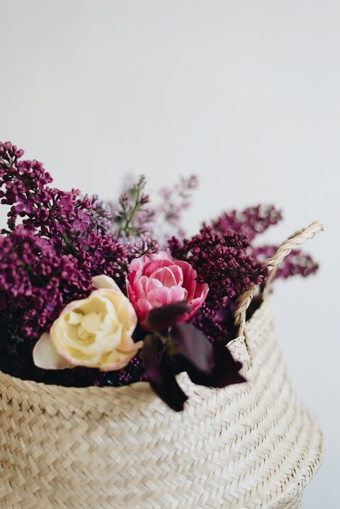 Mixed Flowers in Woven Straw Basket