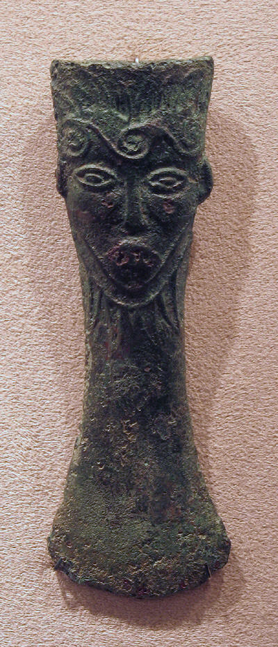 Ancient Bronze Axe with Human Face