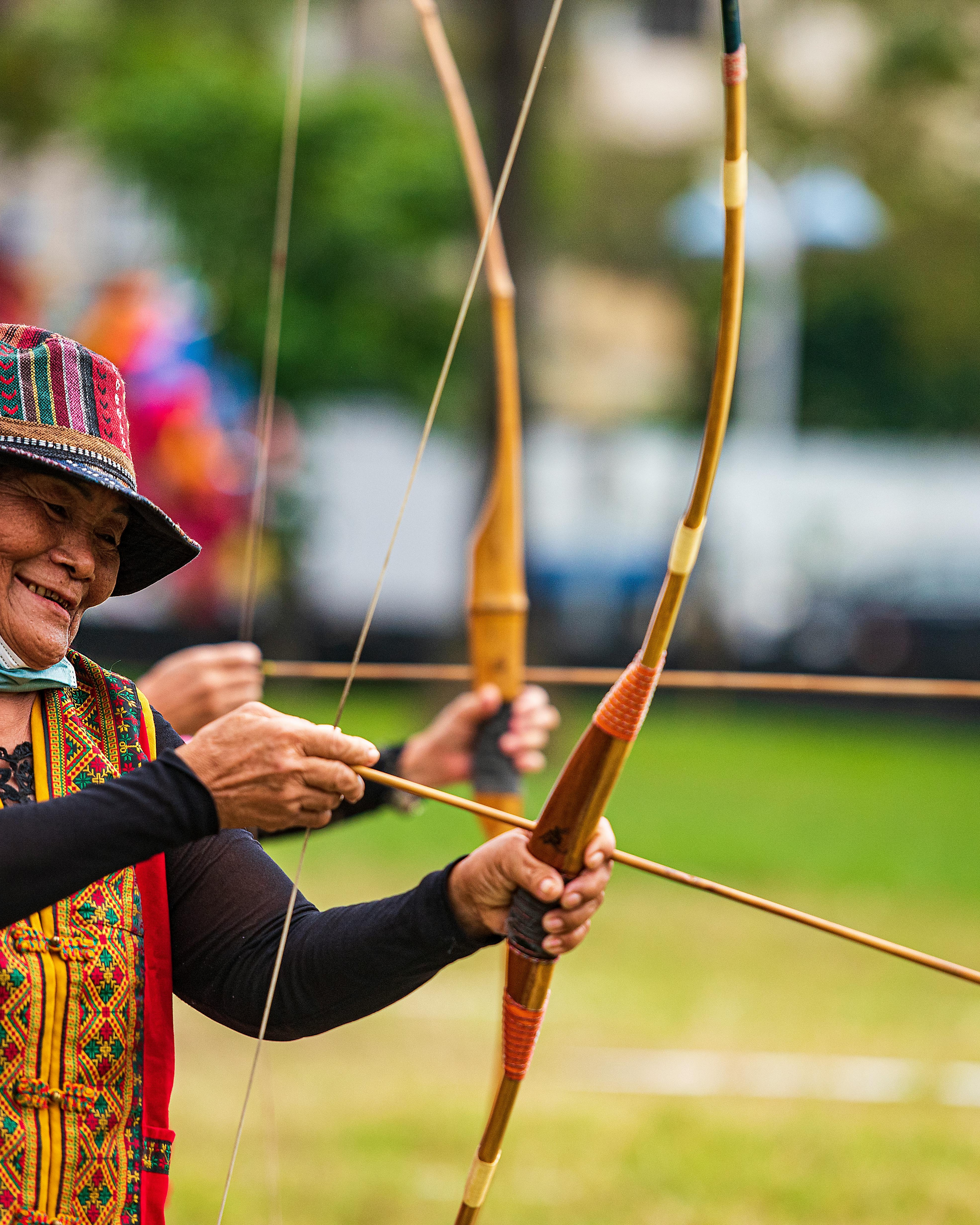 Elderly Woman Practicing Traditional Archery