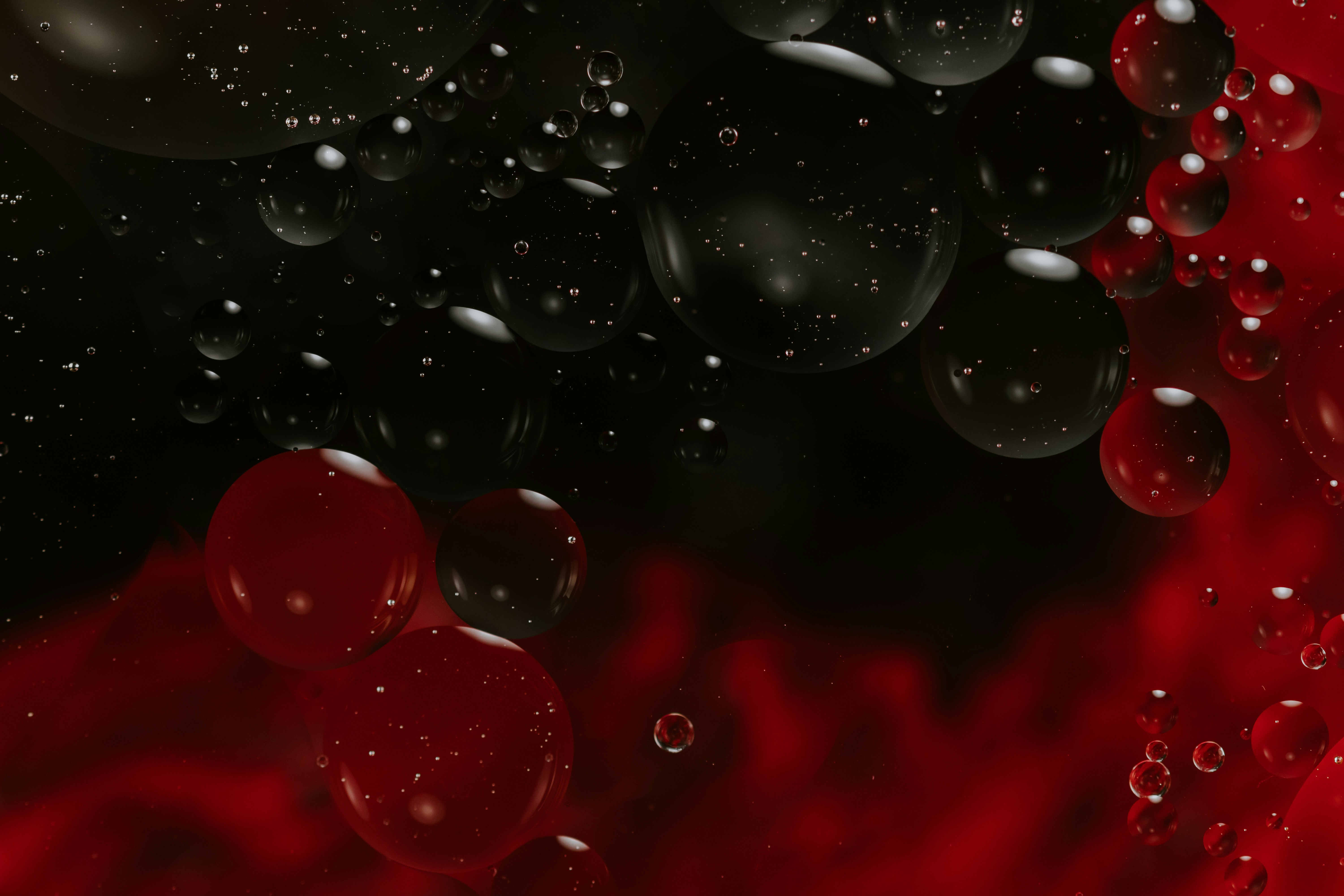 Oil Bubbles on Red and Black Background