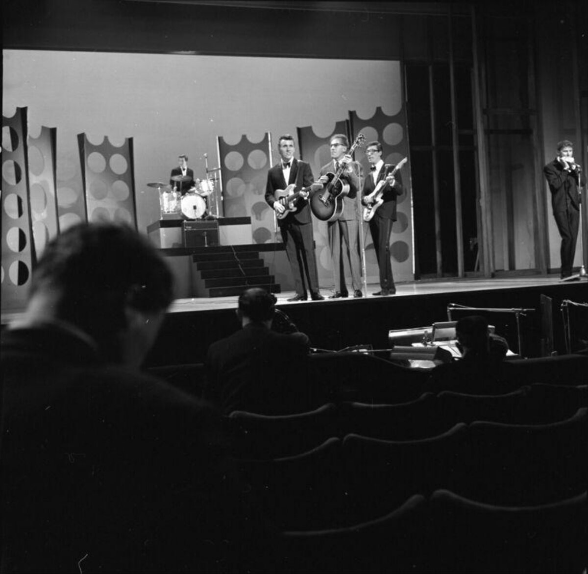 Rock Band Performing on TV Stage