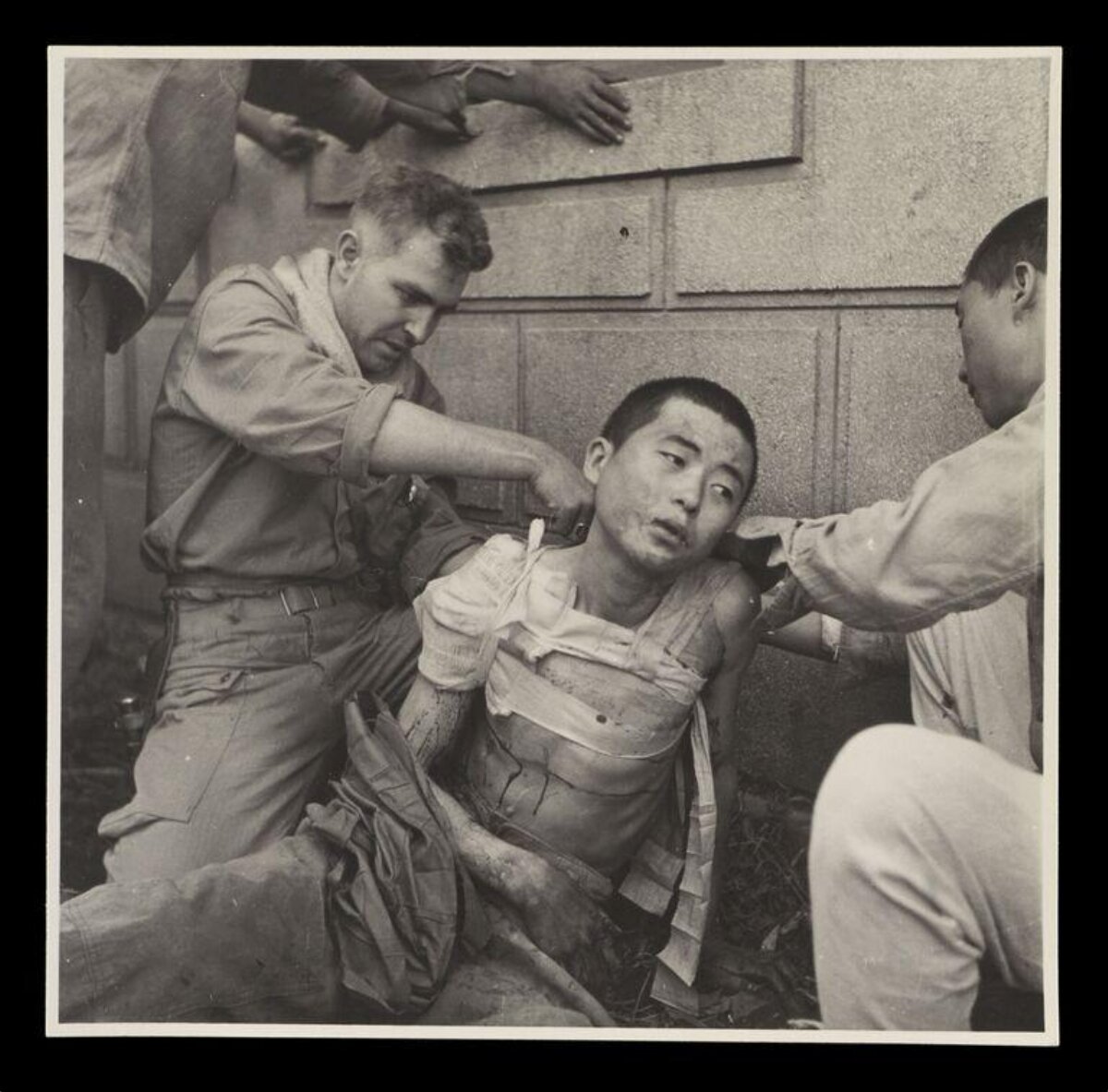 US Medic Treating Wounded Japanese Soldier
