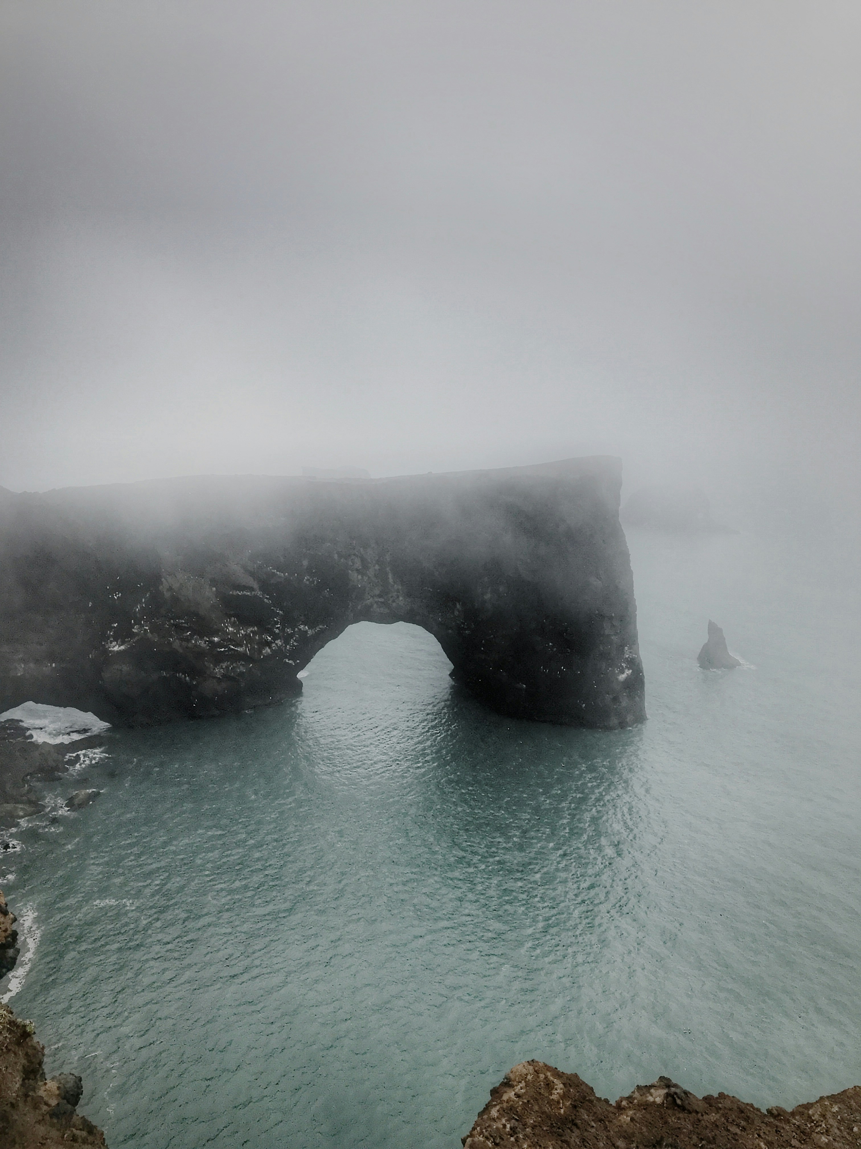 Foggy Coastal Sea Arch