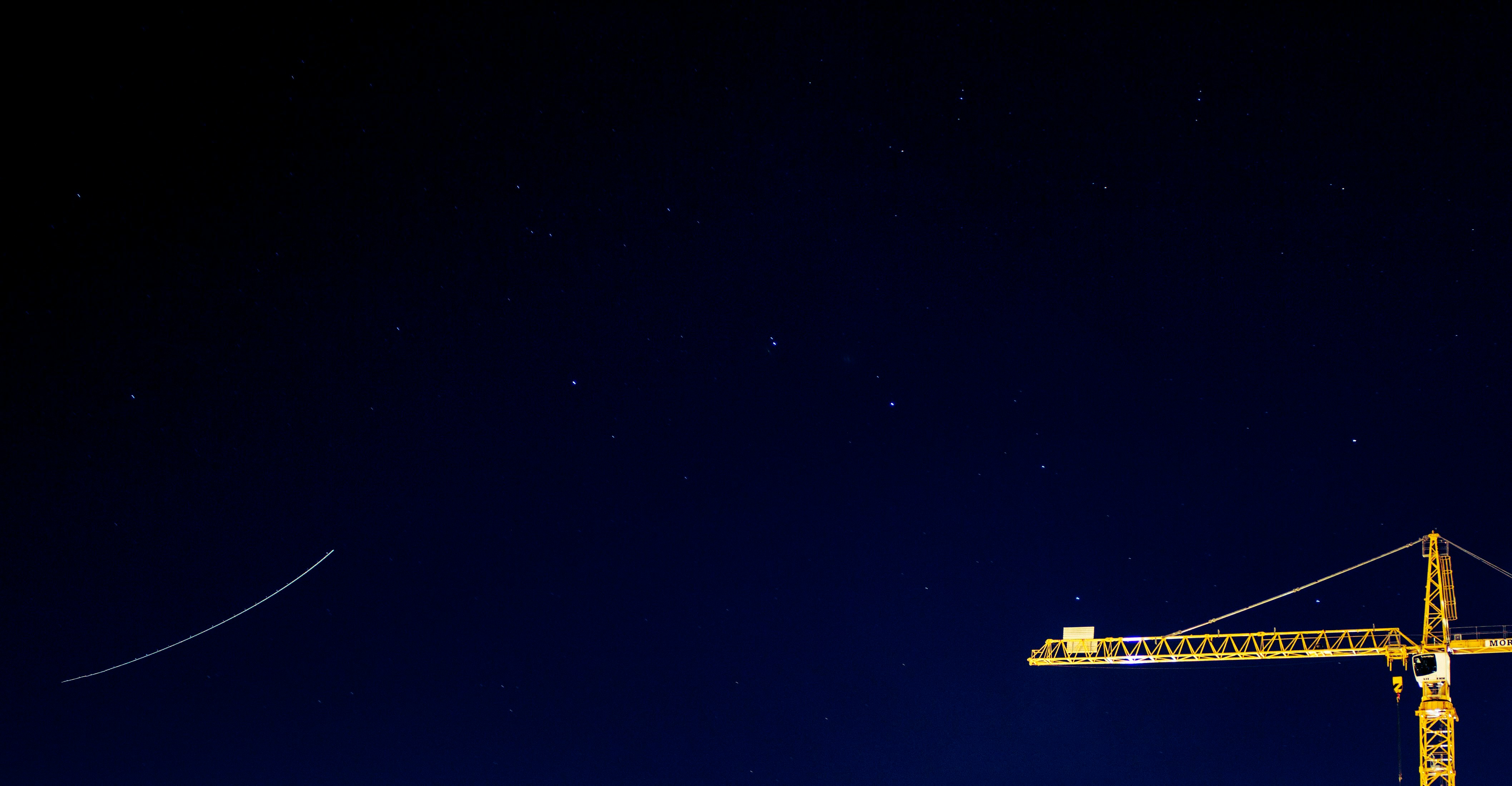 Starry Night Sky With Construction Crane